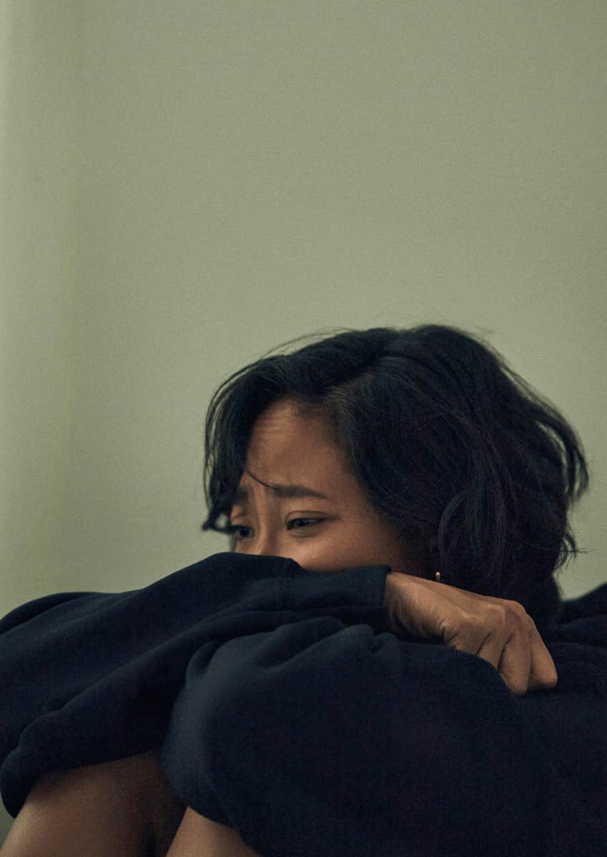 upset woman realizing abusers make her doubt her decision making skills