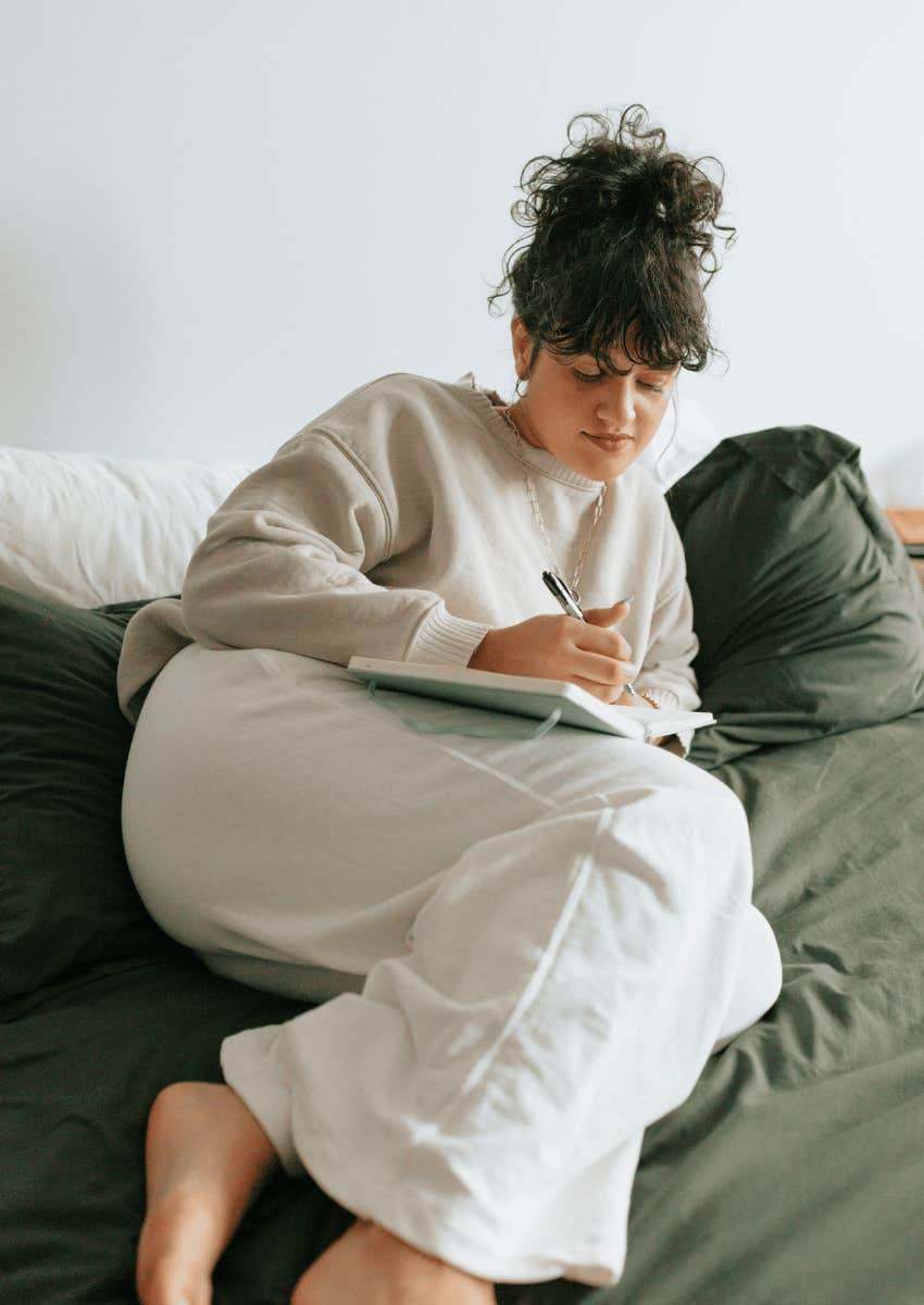 woman not wanting to think about someone writing lists to hold onto her resolve