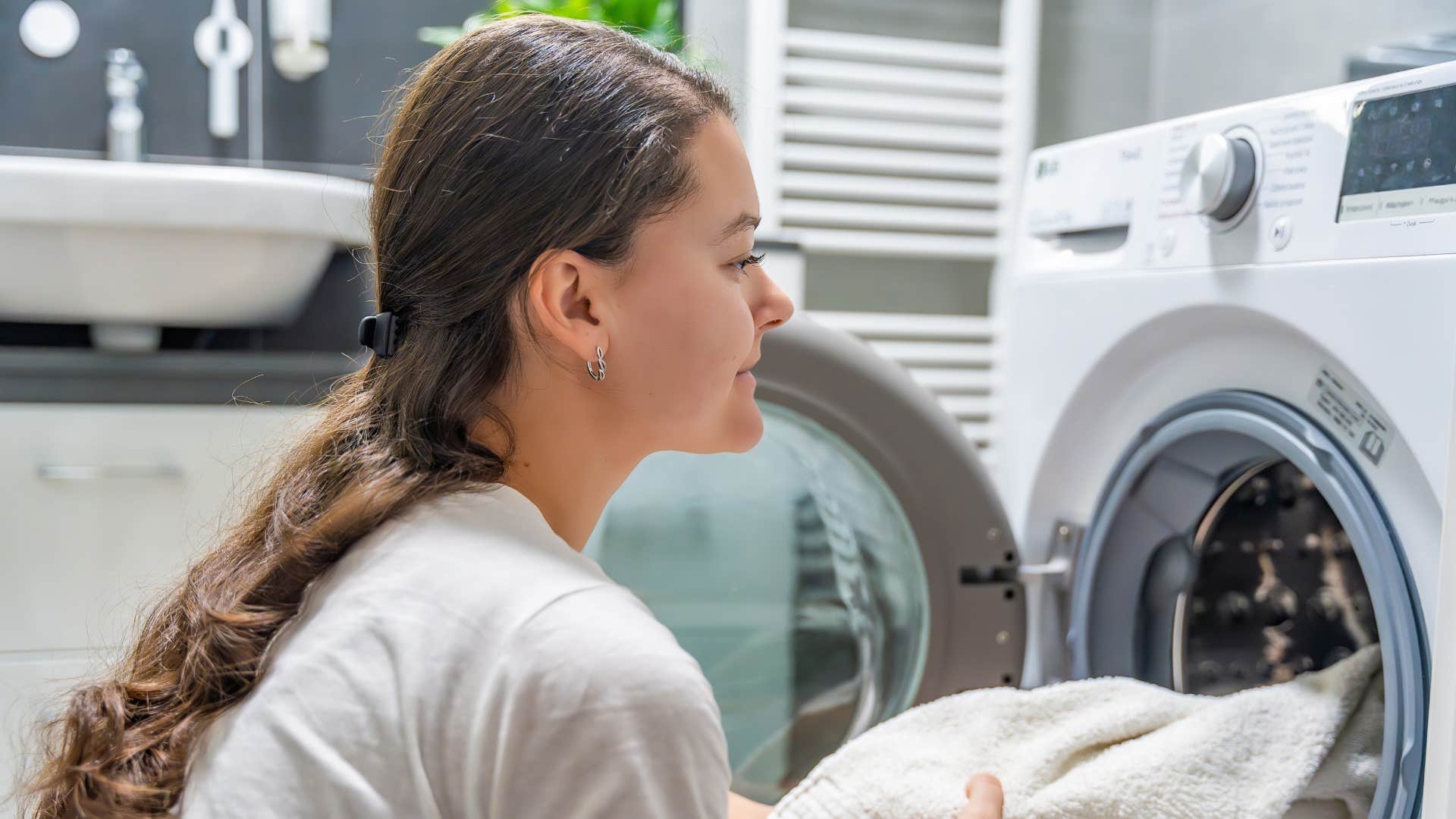 woman who married a blue-collar man dividing clothes for the laundry