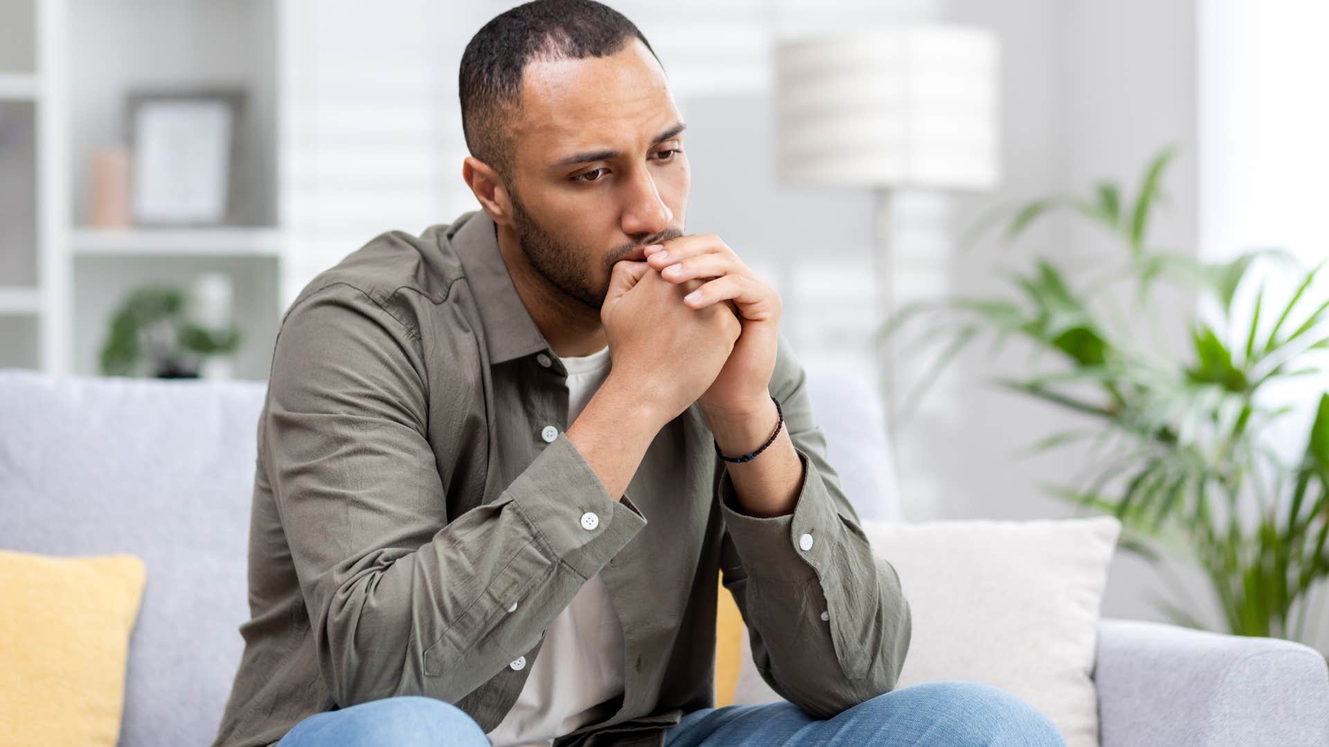 disrespected man who runs from hard conversations sitting alone
