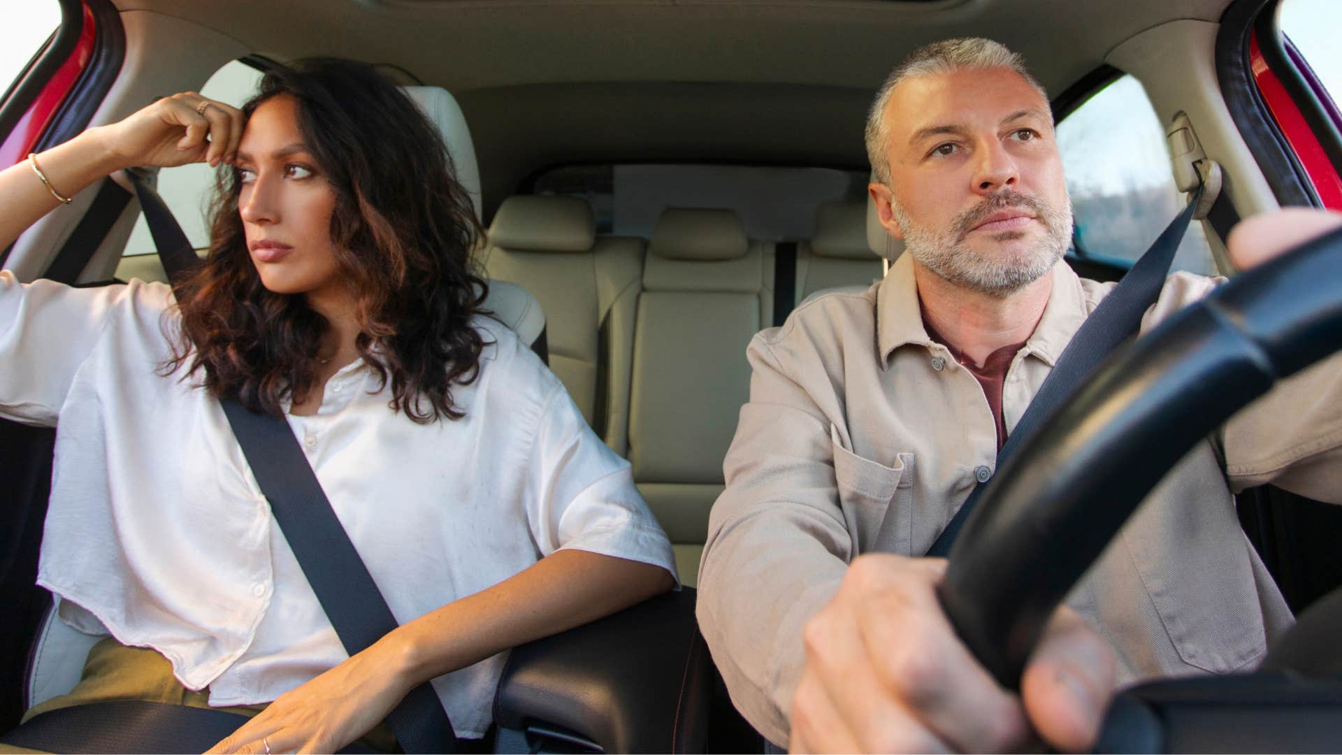 woman saying it's fine to her partner driving