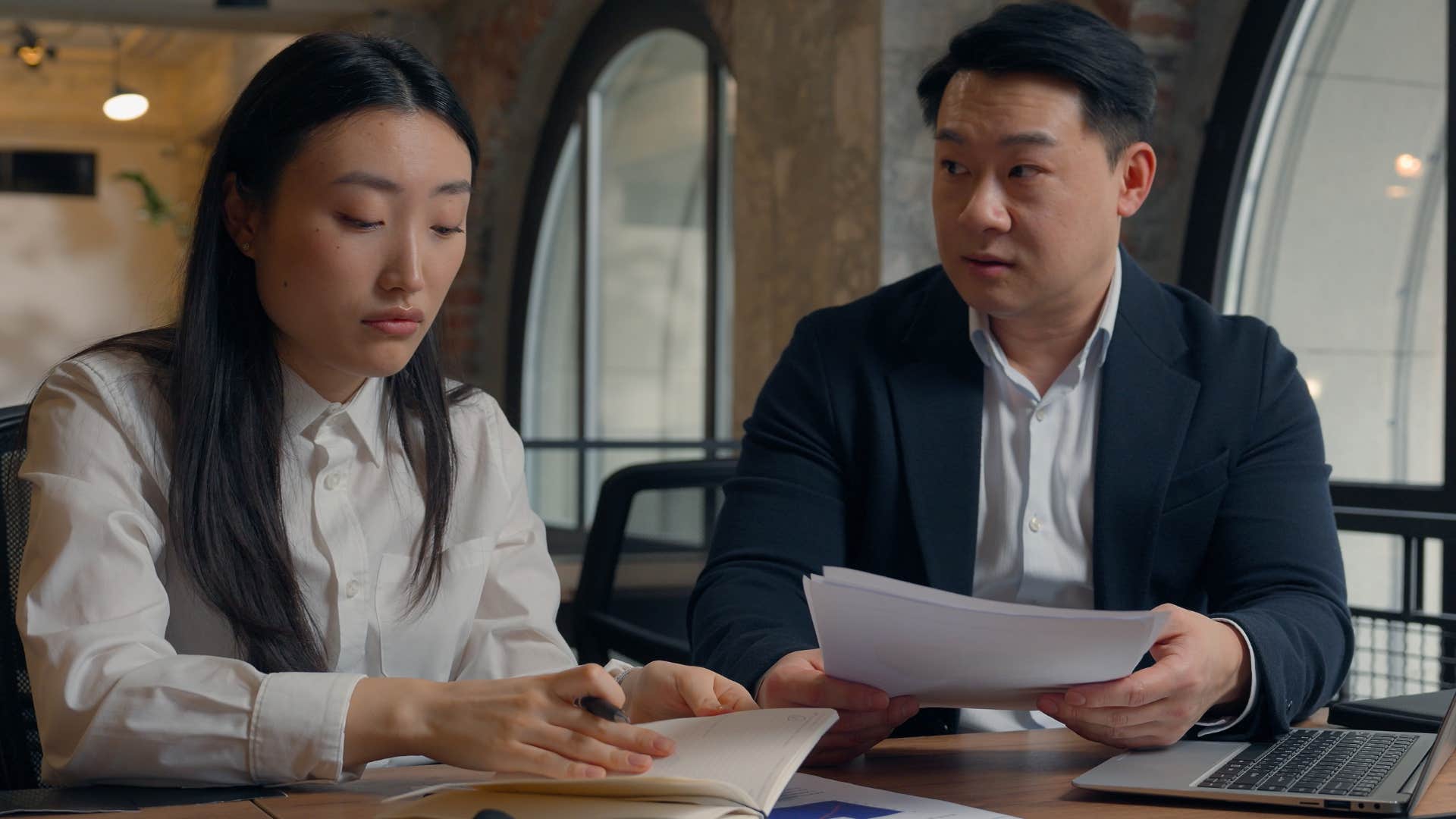 disrespectful woman telling male colleague you're so incompetent