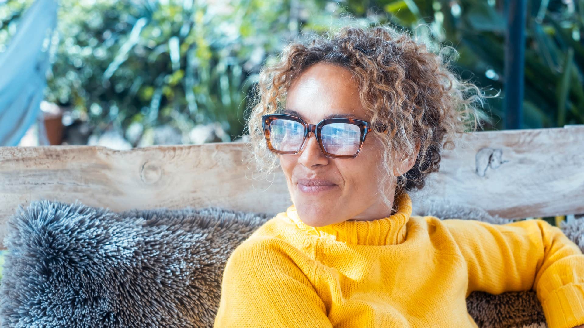 Peaceful woman relaxes showing connection to self