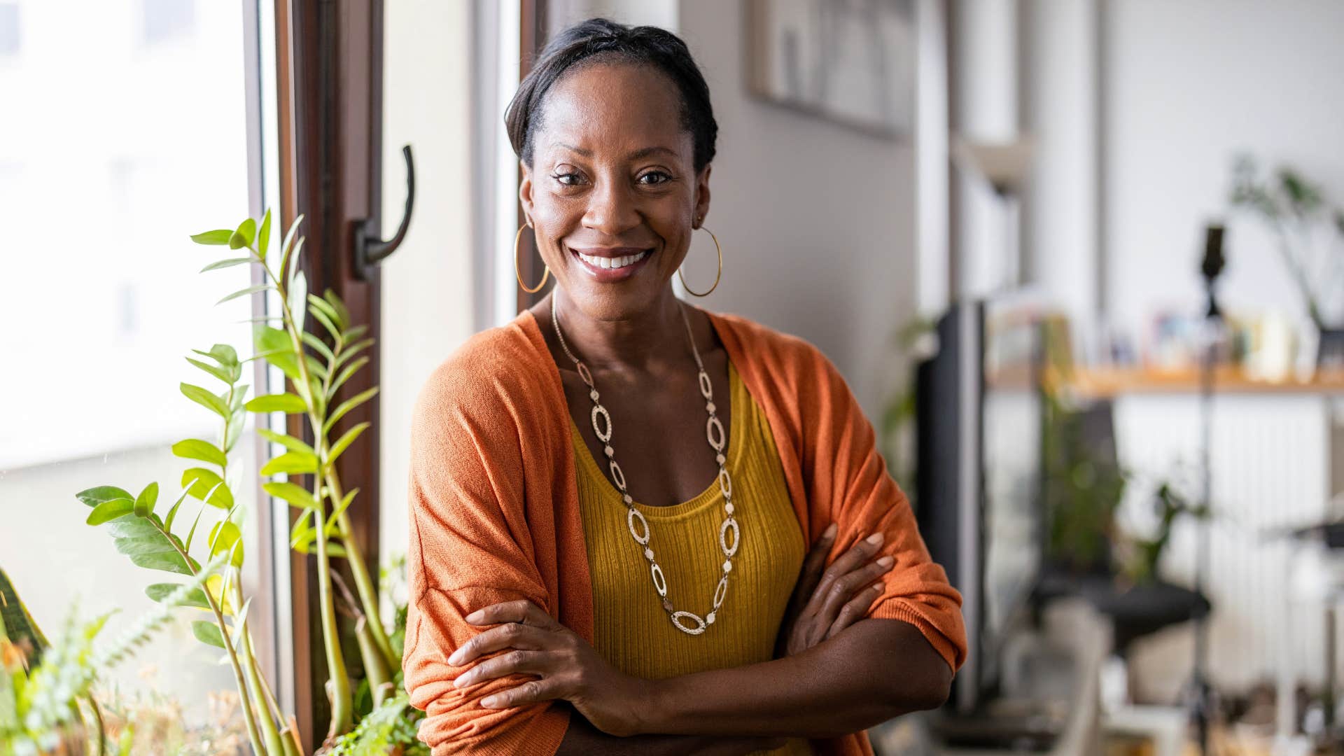 confident woman in her kitchen with strong values and standards