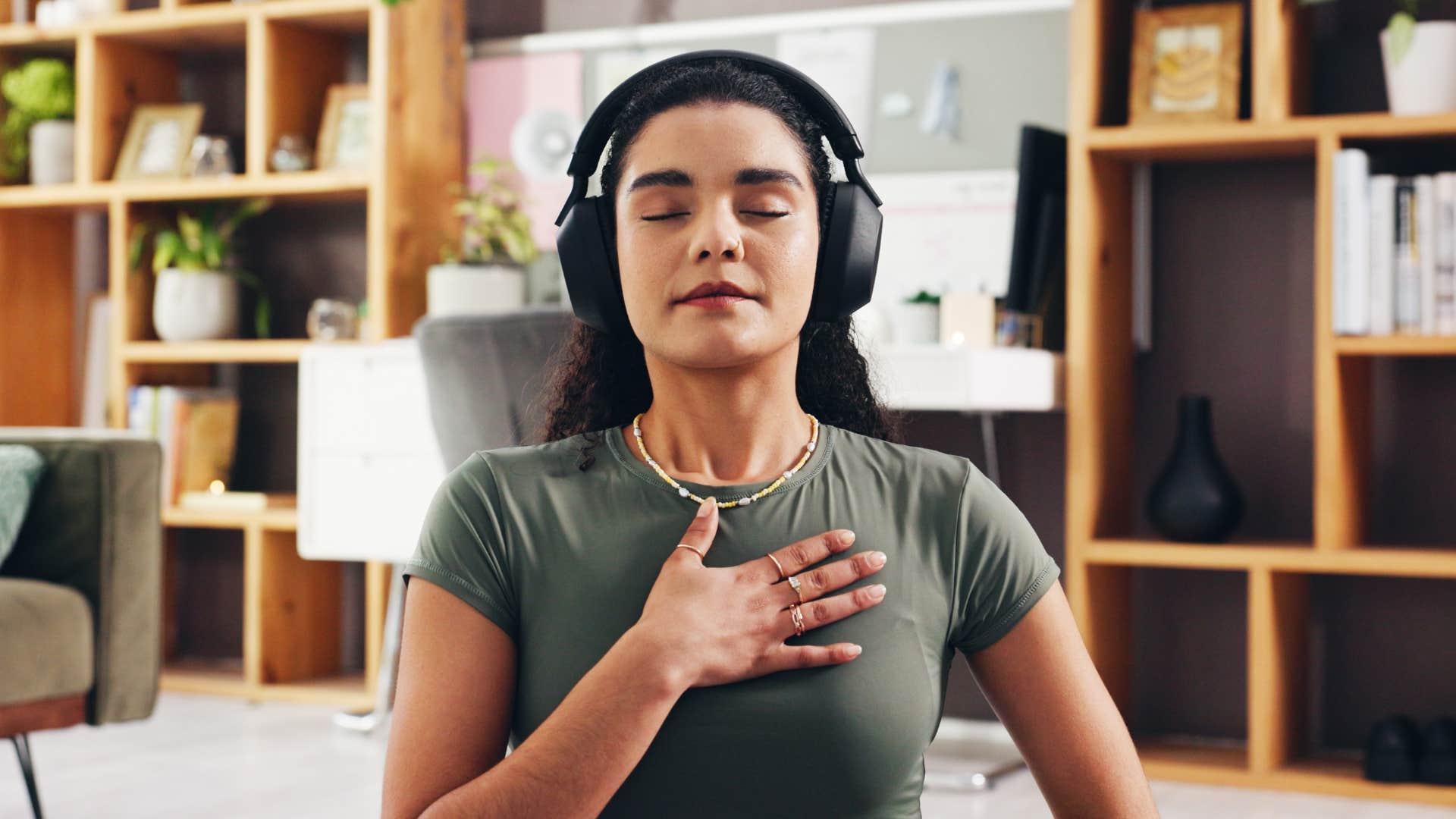 calm woman meditating to regulate herself emotionally