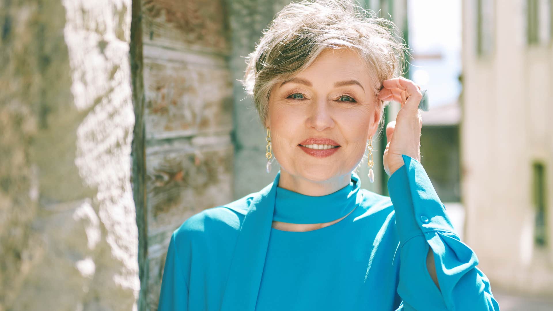 Woman with short hair who's comfortable with taking up space