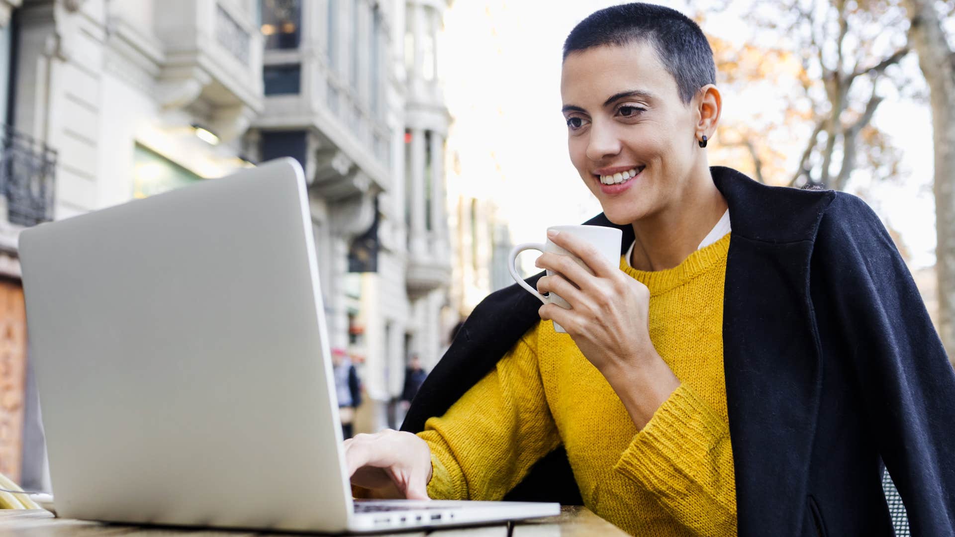 Woman with short hair who doesn't seek approval from others working outside