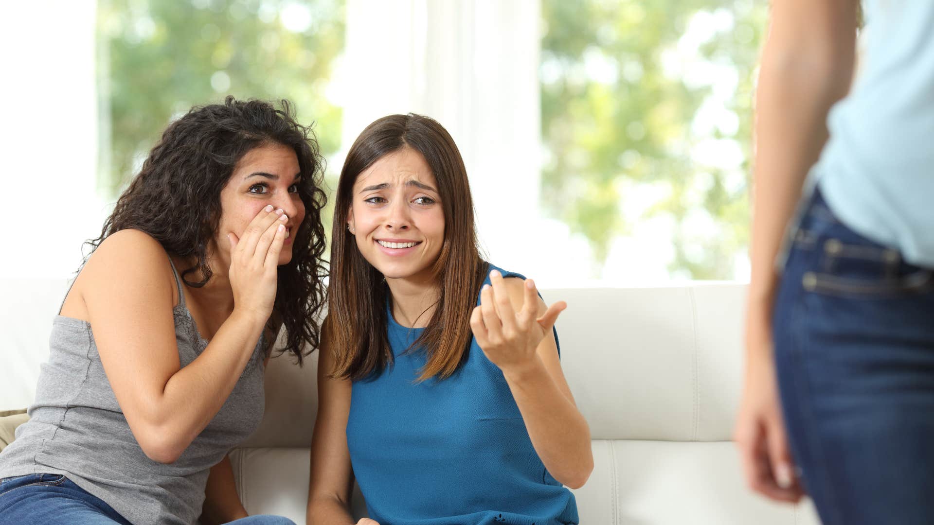 Gossipy friends whisper showing unlikable trait