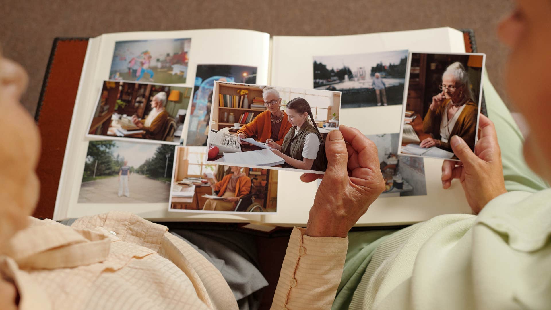 Older person looks at photo album showing insight into insecurities