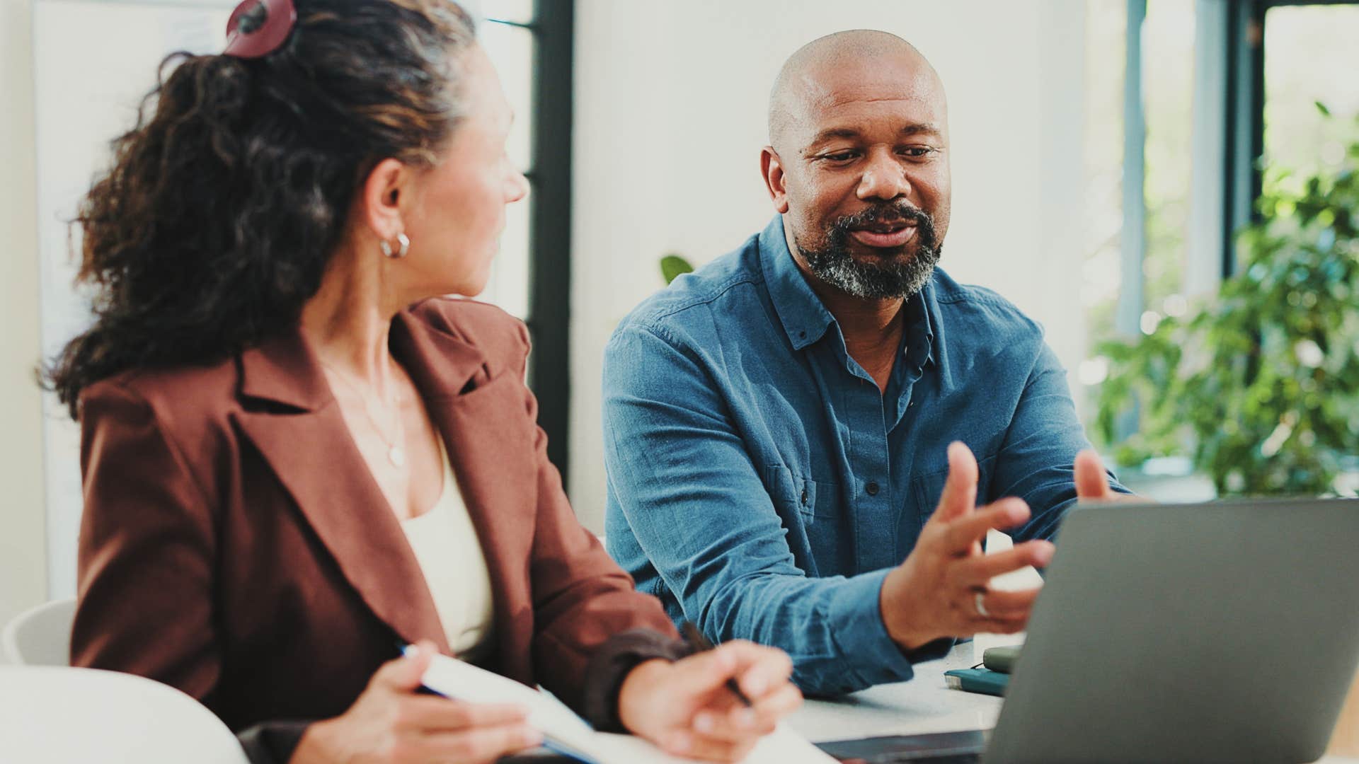 Happy business colleagues chat showing habit of purposeful action