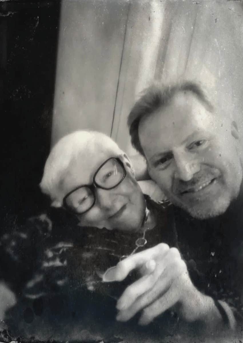 author posing with his mom