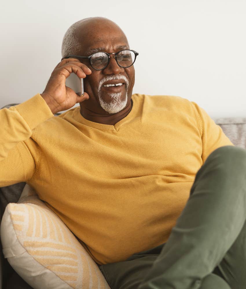 Boomer man talks on phone showing love for his children