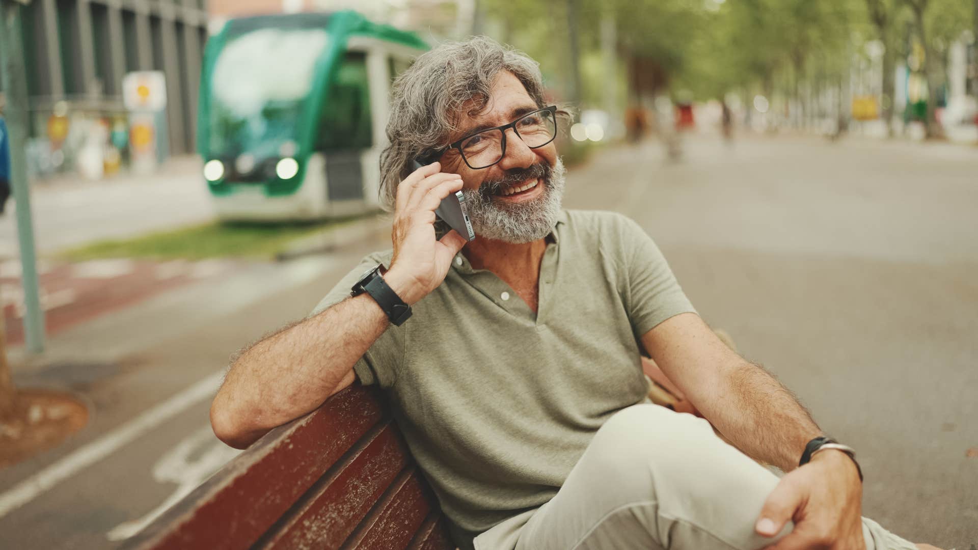 man on the phone with friend asking where they are