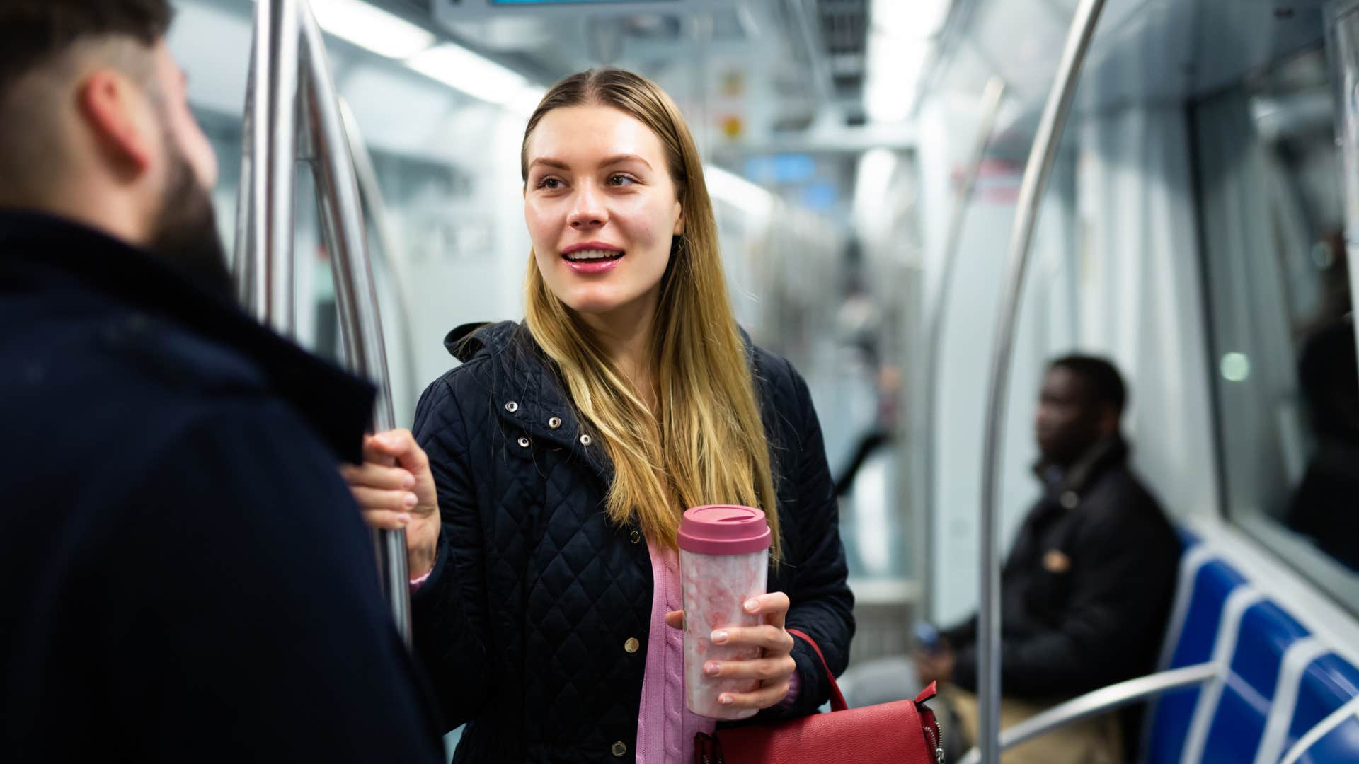 woman on the train saying excuse me