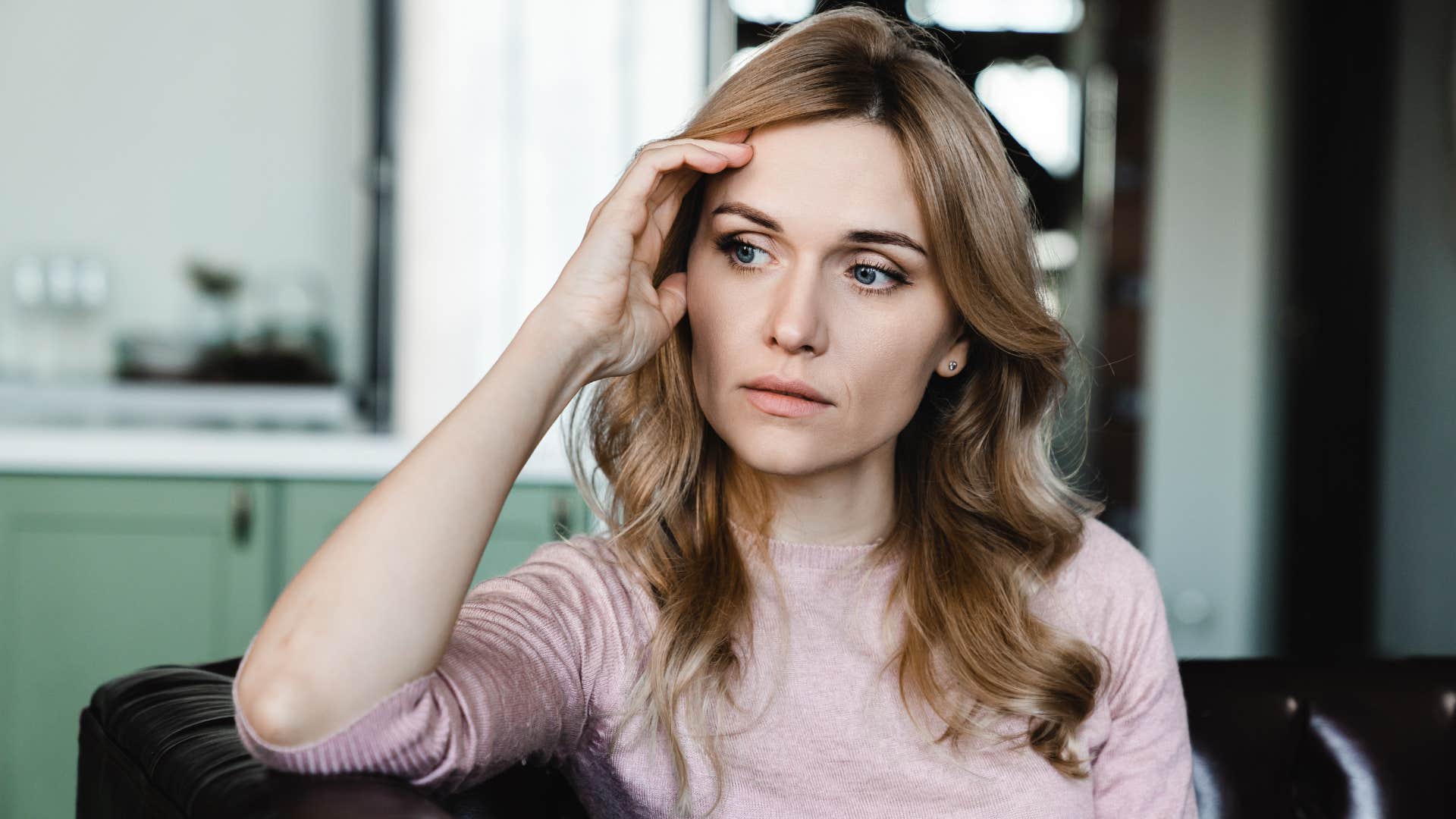 woman ignoring her gut instincts feeling unsure