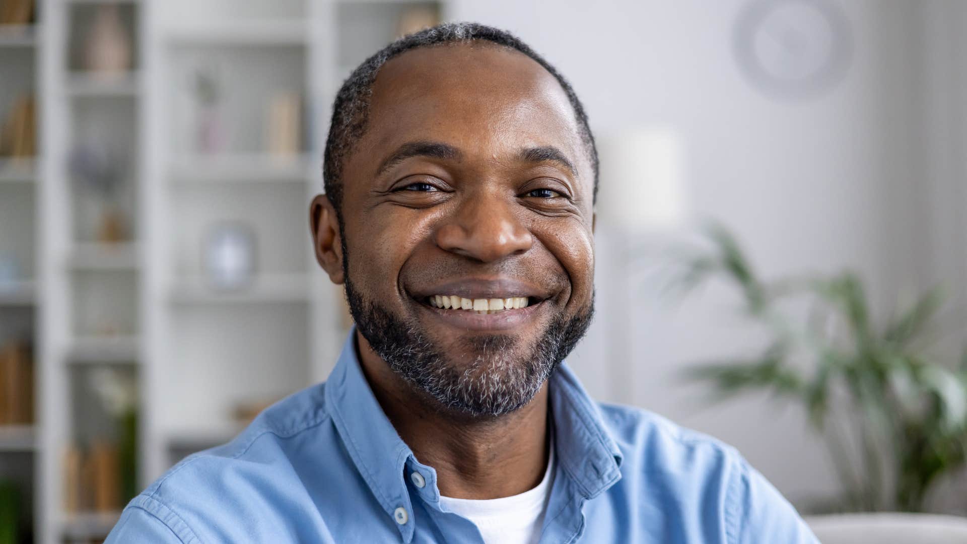 man who rarely makes the same mistakes twice smiling confidently