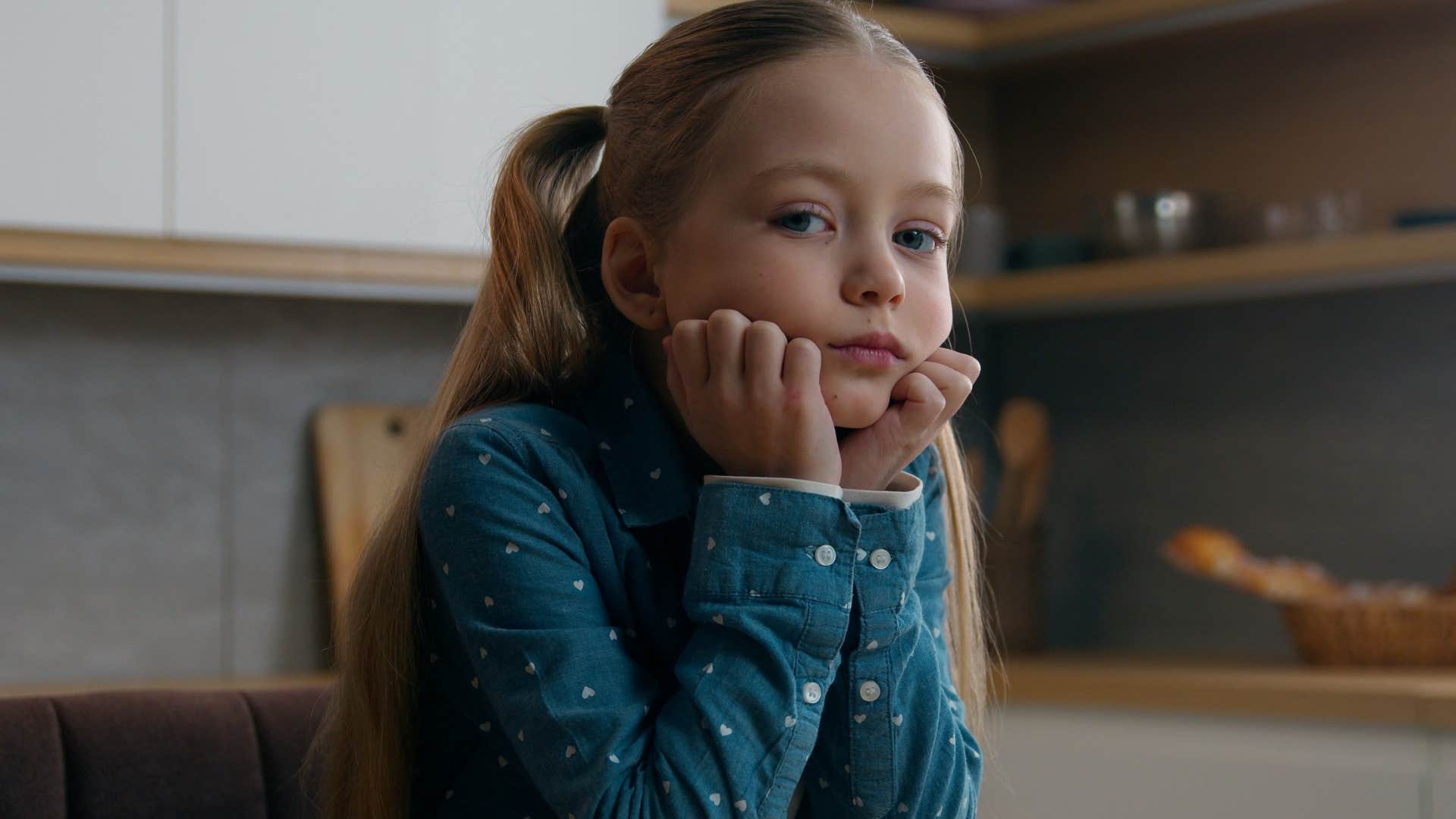 Little girl whose boredom crafted a healthy attention span at home.