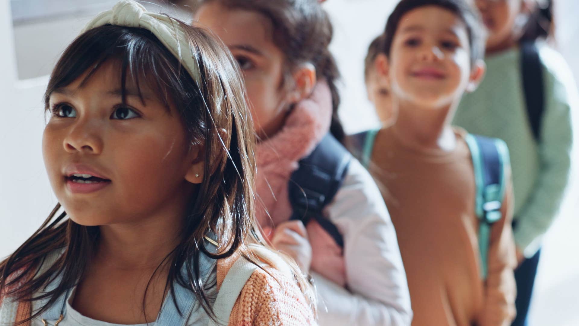 Kids learning the art of patience in school.