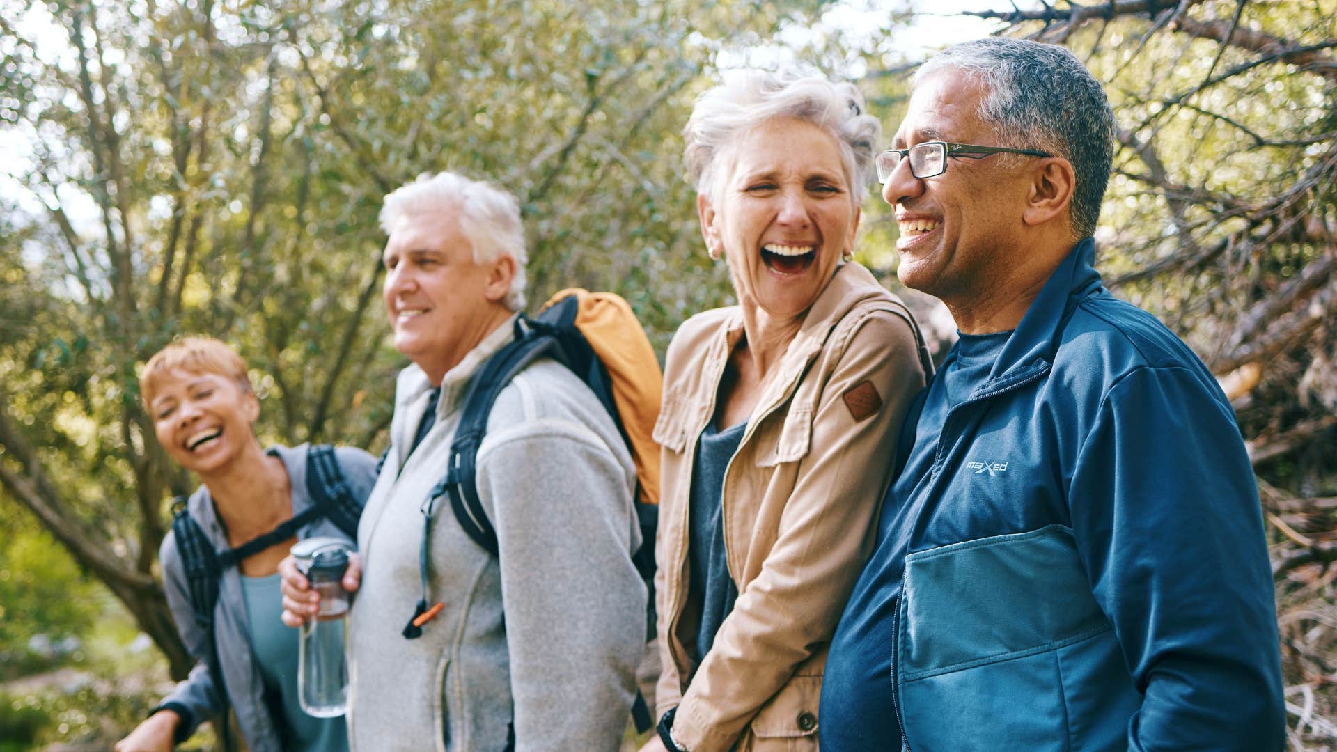 group of happy older people get exposure to nature