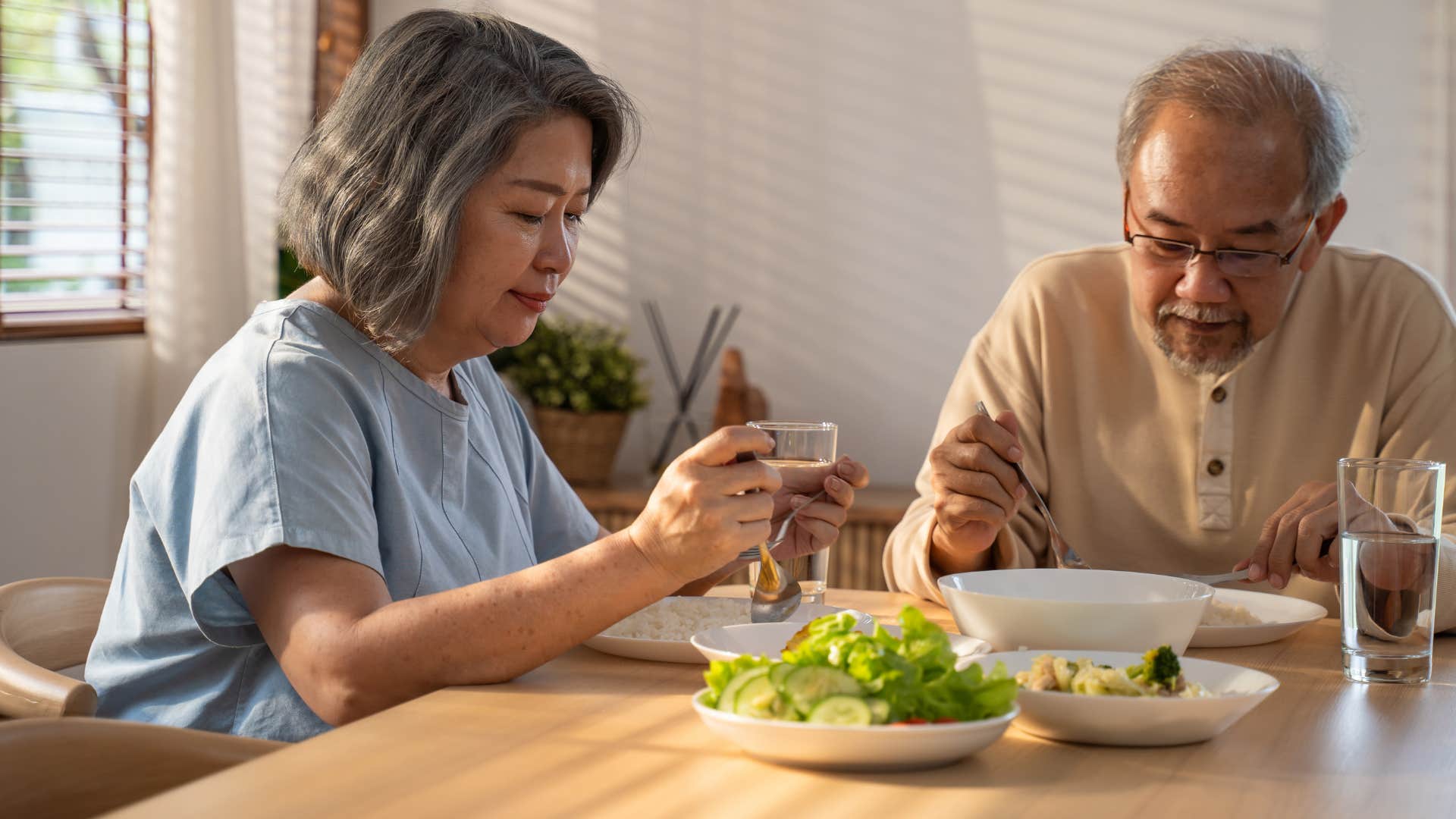 older couple share healthy meal