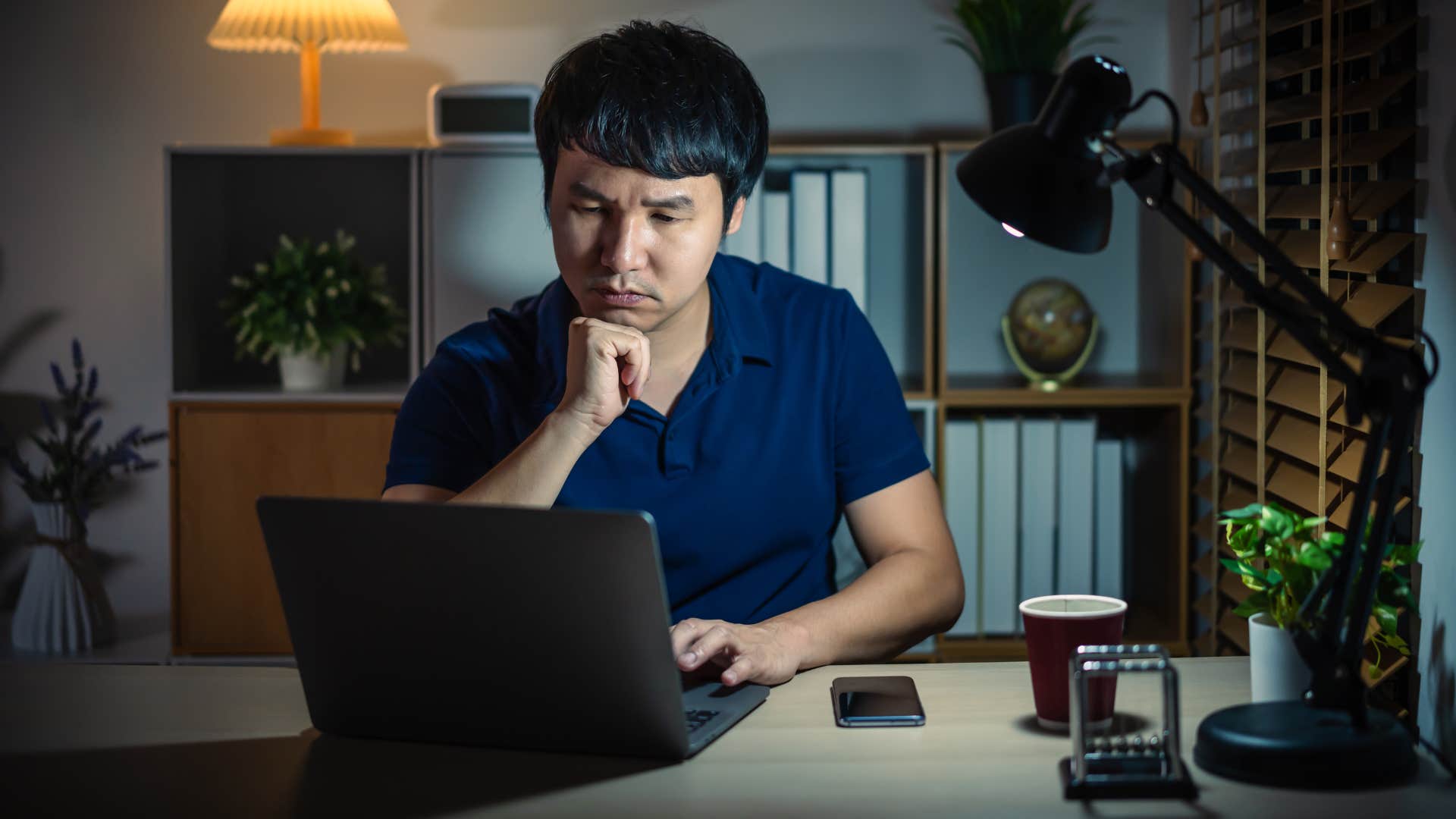 man who is a night owl working late