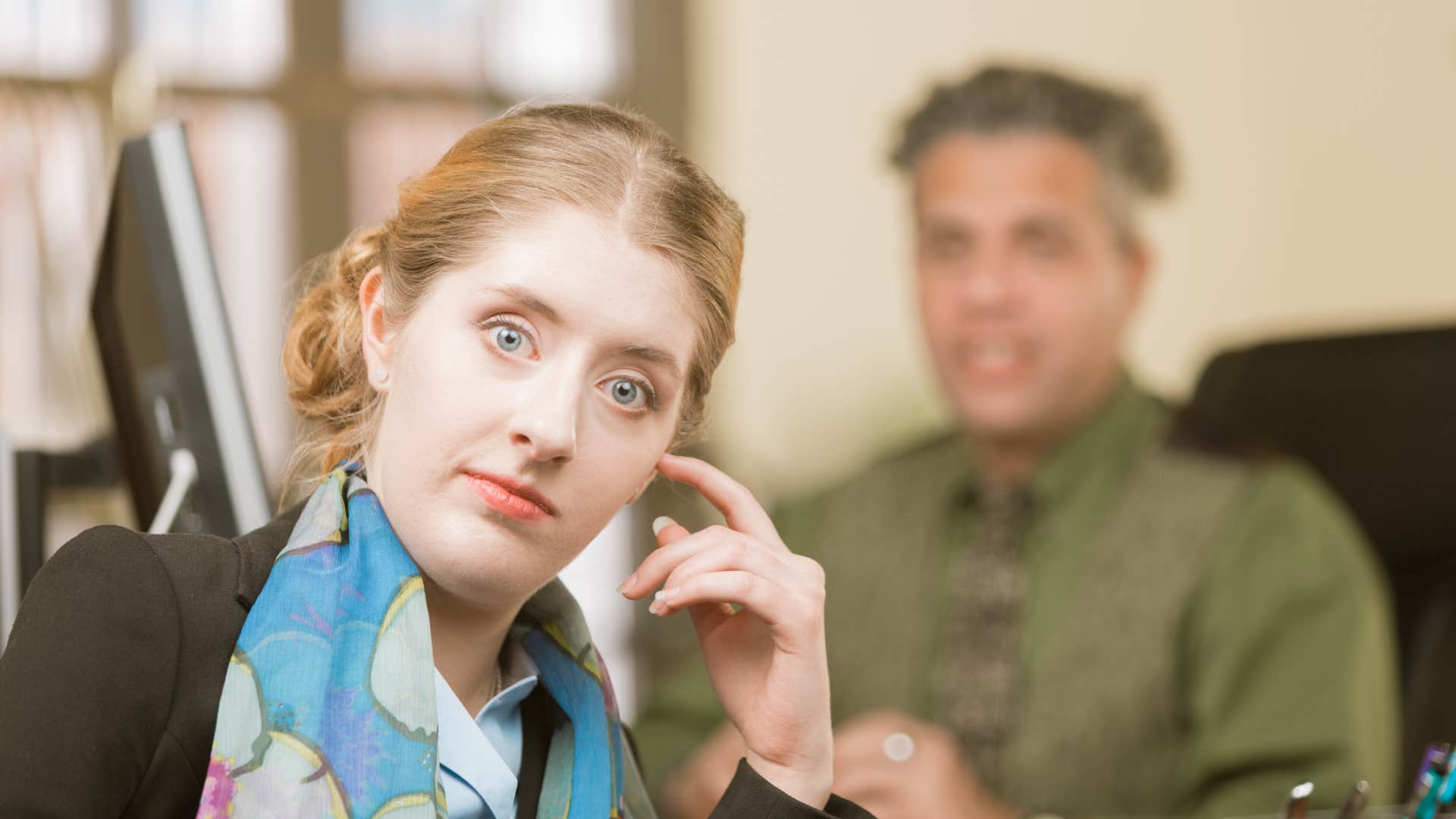 Annoyed person with boss showing lost passion in job