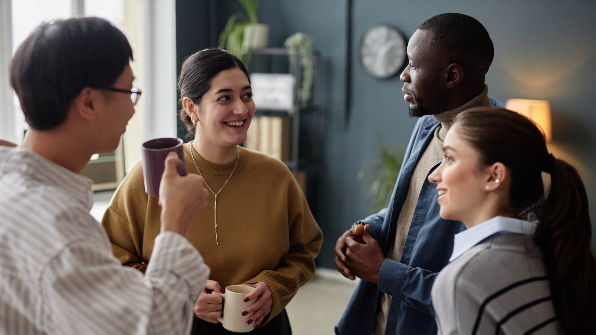 Recruiter chats with applicants after interview