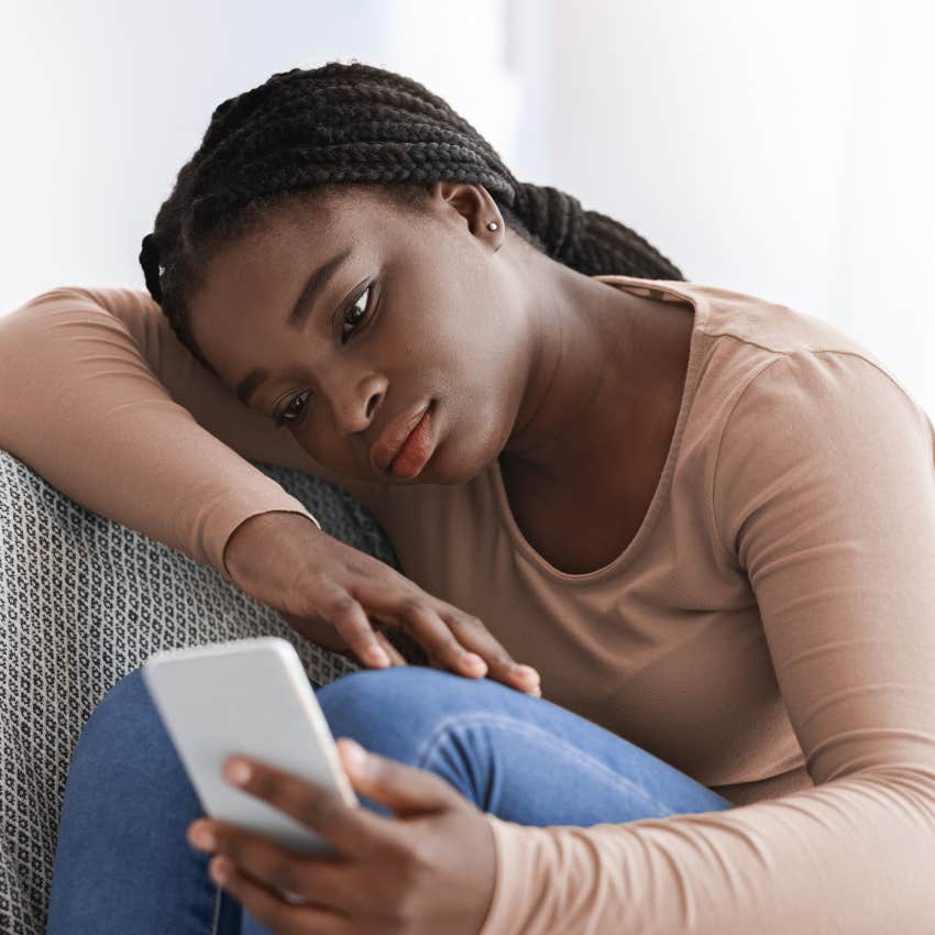 lonely childfree woman waiting for a mom friend to call