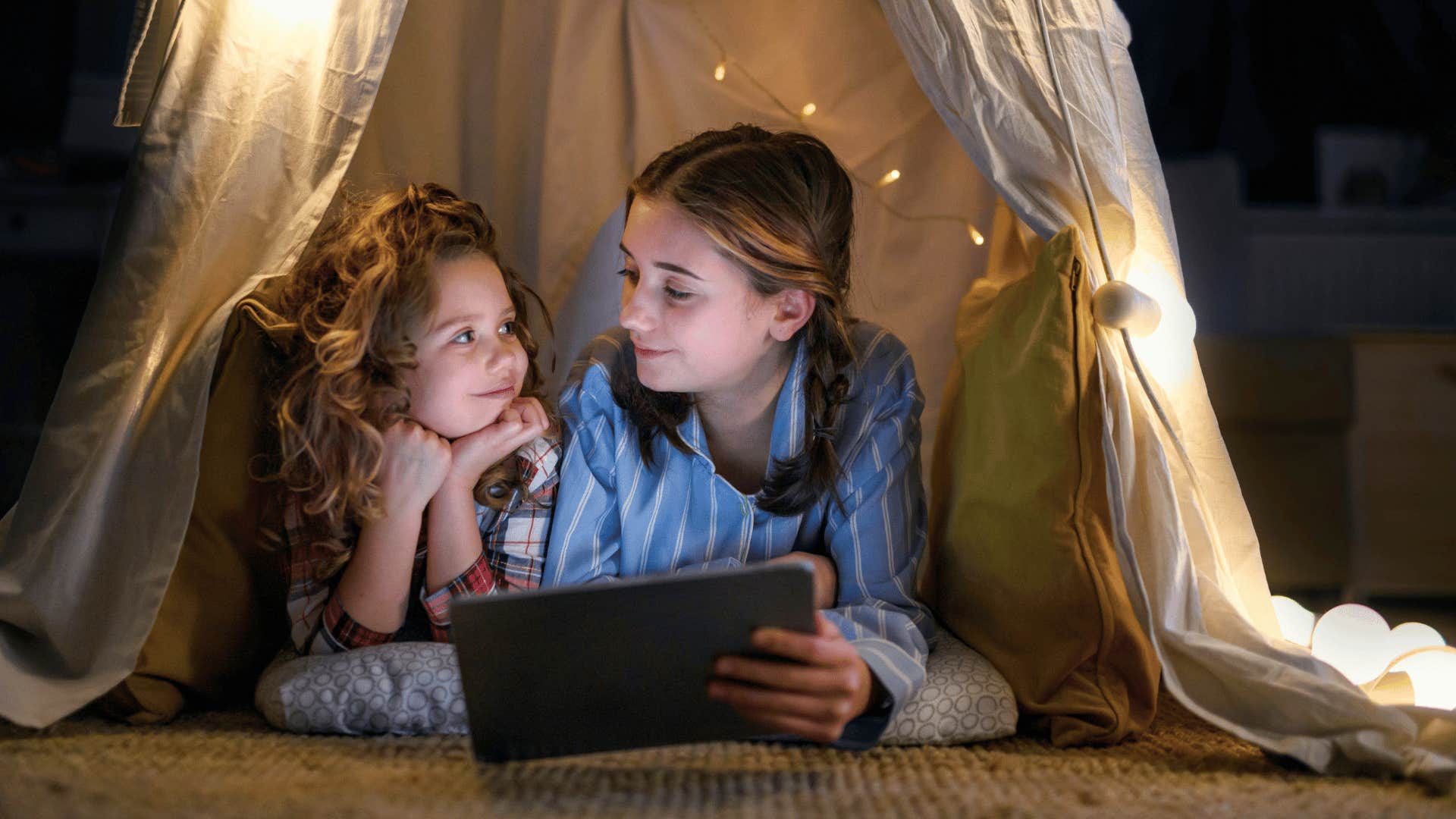 children playing in indoor fort