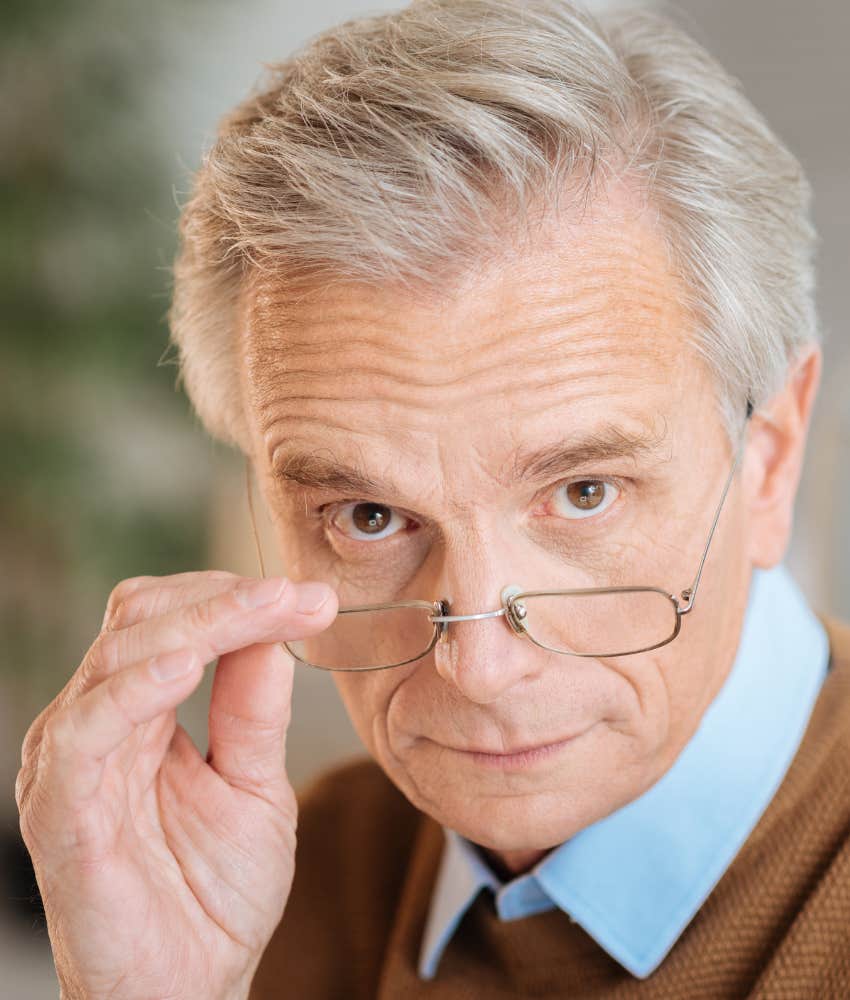 Cynical elder looks down on you showing he questions your wisdom and civility