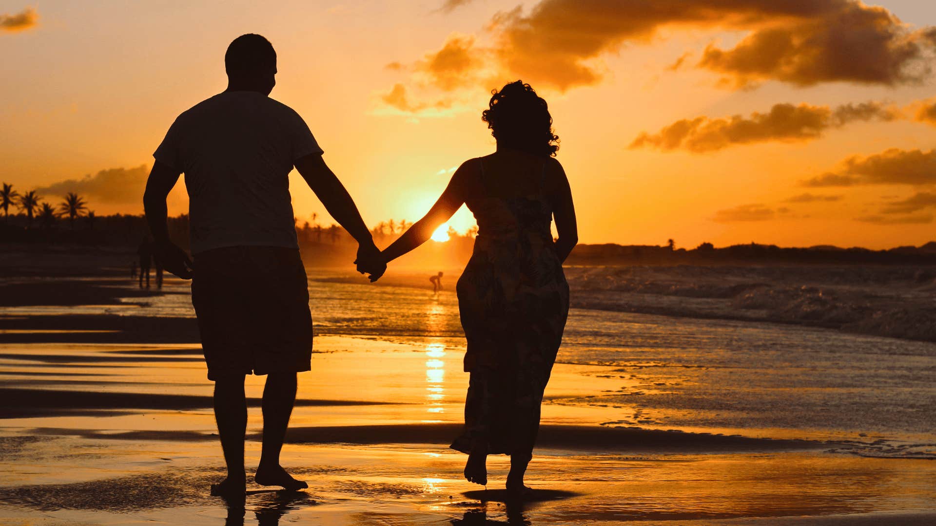 couple at sunset on beach walk stay together for life
