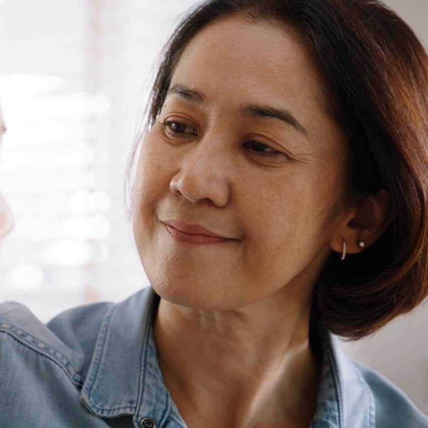 woman who's always generous smiling at her adult daughter