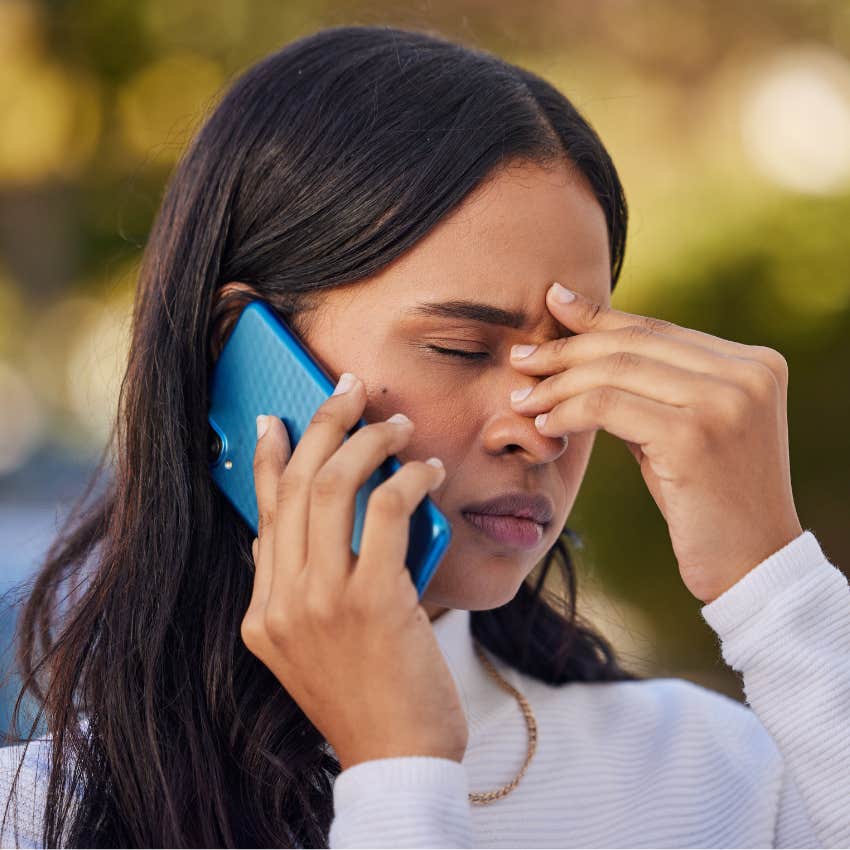stressed woman on the phone over-explaining her decisions and feelings