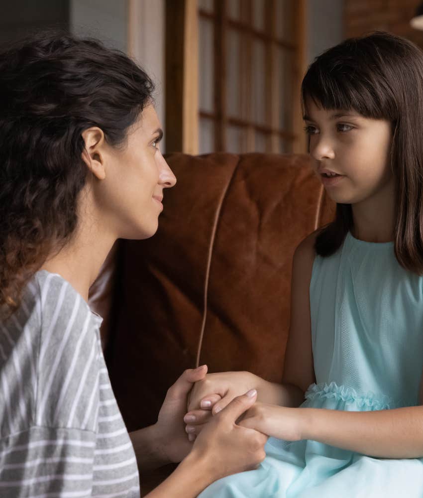 Concerned parent talks to kid showing lesson of self-respect 