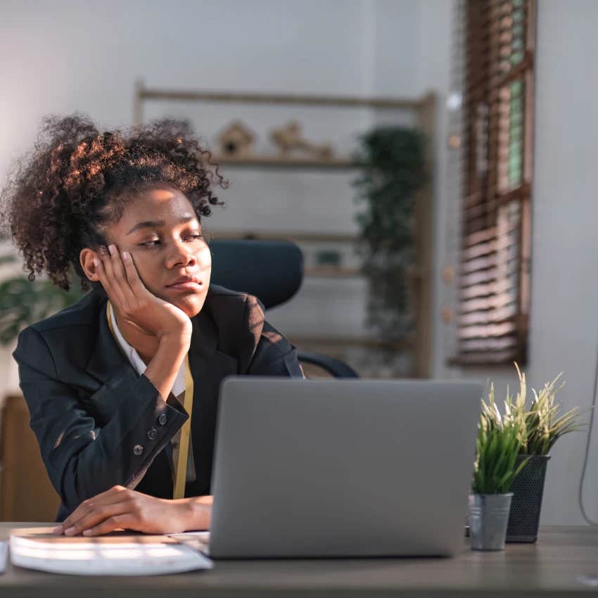 woman at work wondering if people are actually motivated or faking it