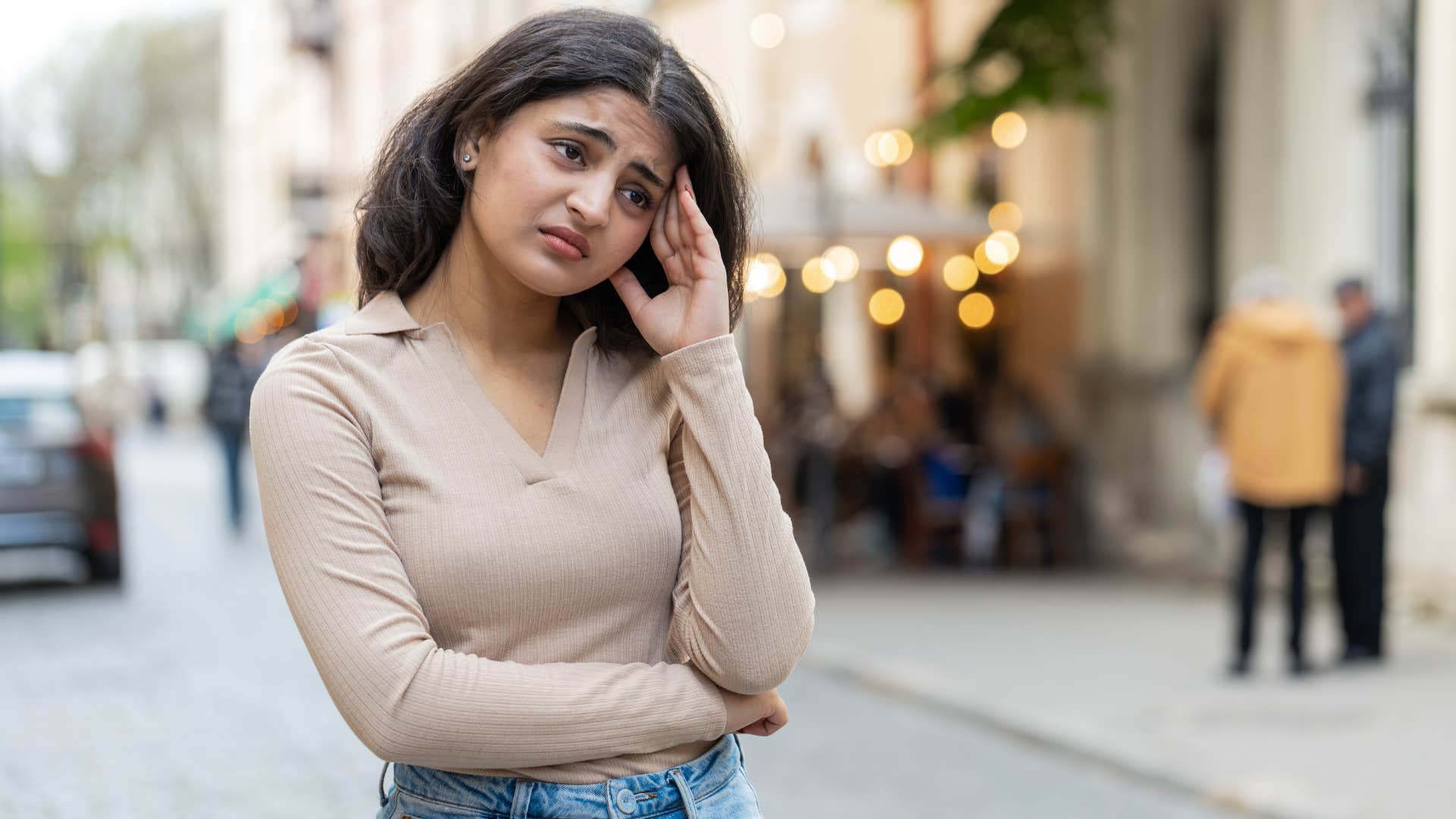 unhappy woman walking away from mouth sounds nearby