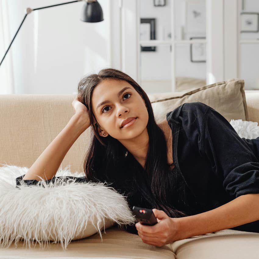 woman learning something while watching true crime