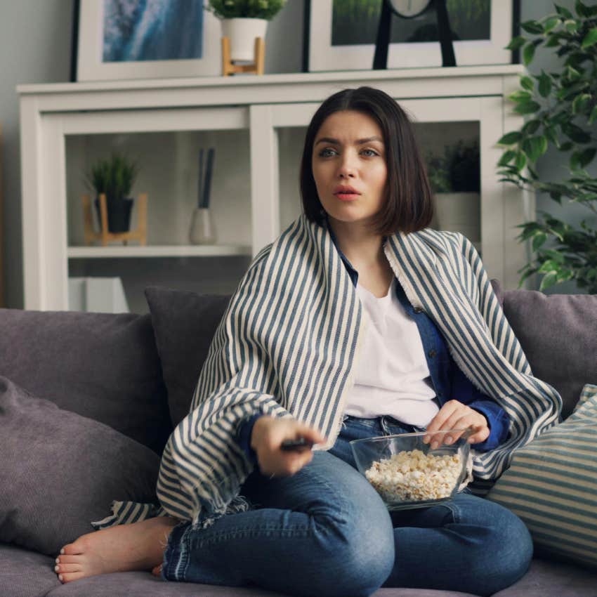 woman watching true crime who wants to understand why crimes are committed