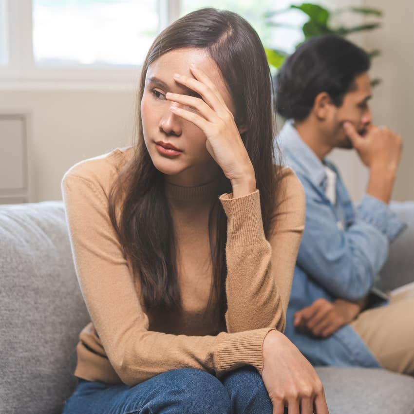 woman physically uncomfortable by fake man not calling him out
