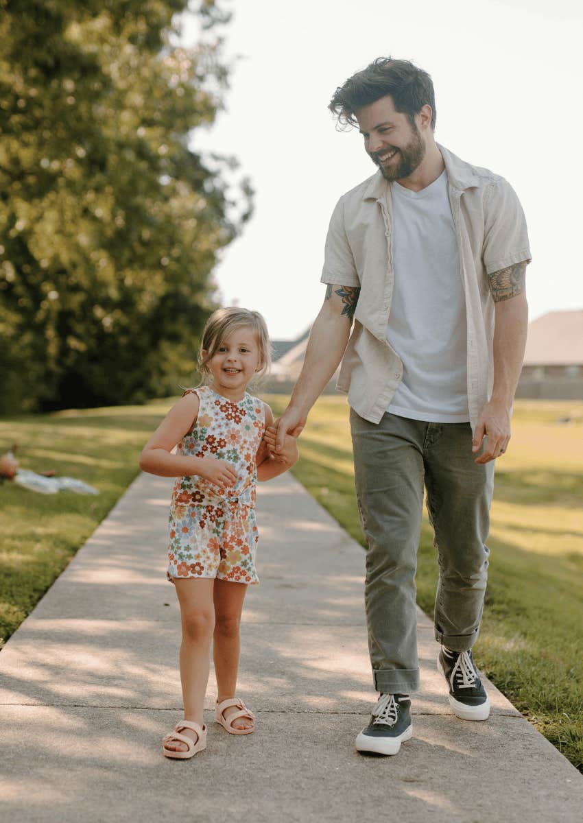 father and daughter walking together