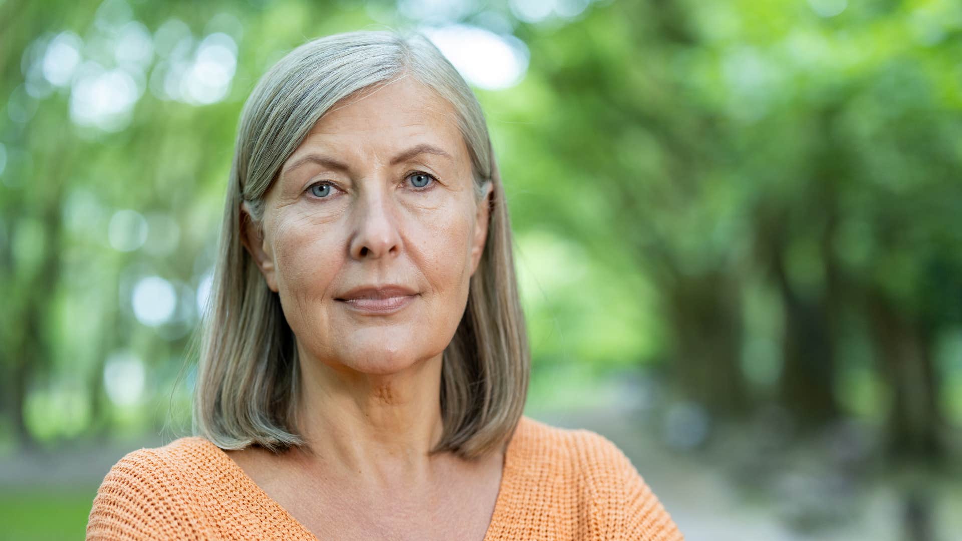 narcissistic woman smirking saying i didn't mean it that way