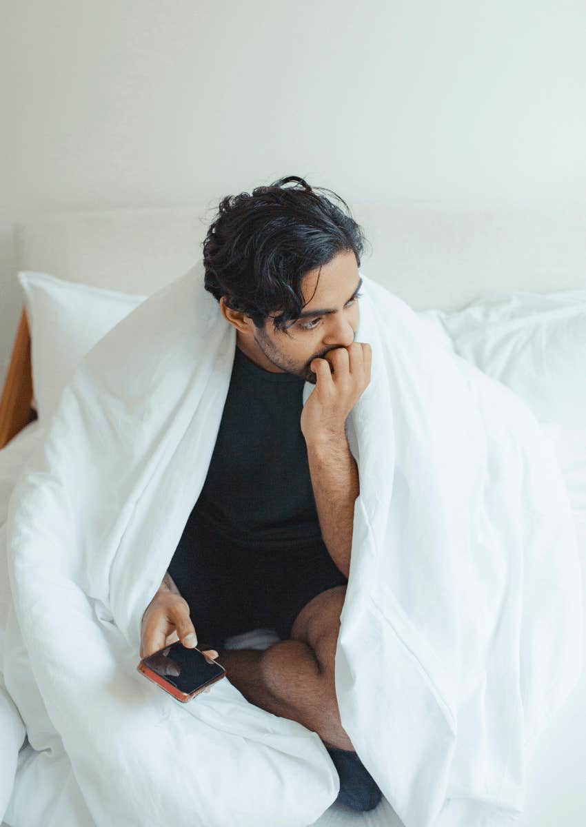 forget man sitting on his bed