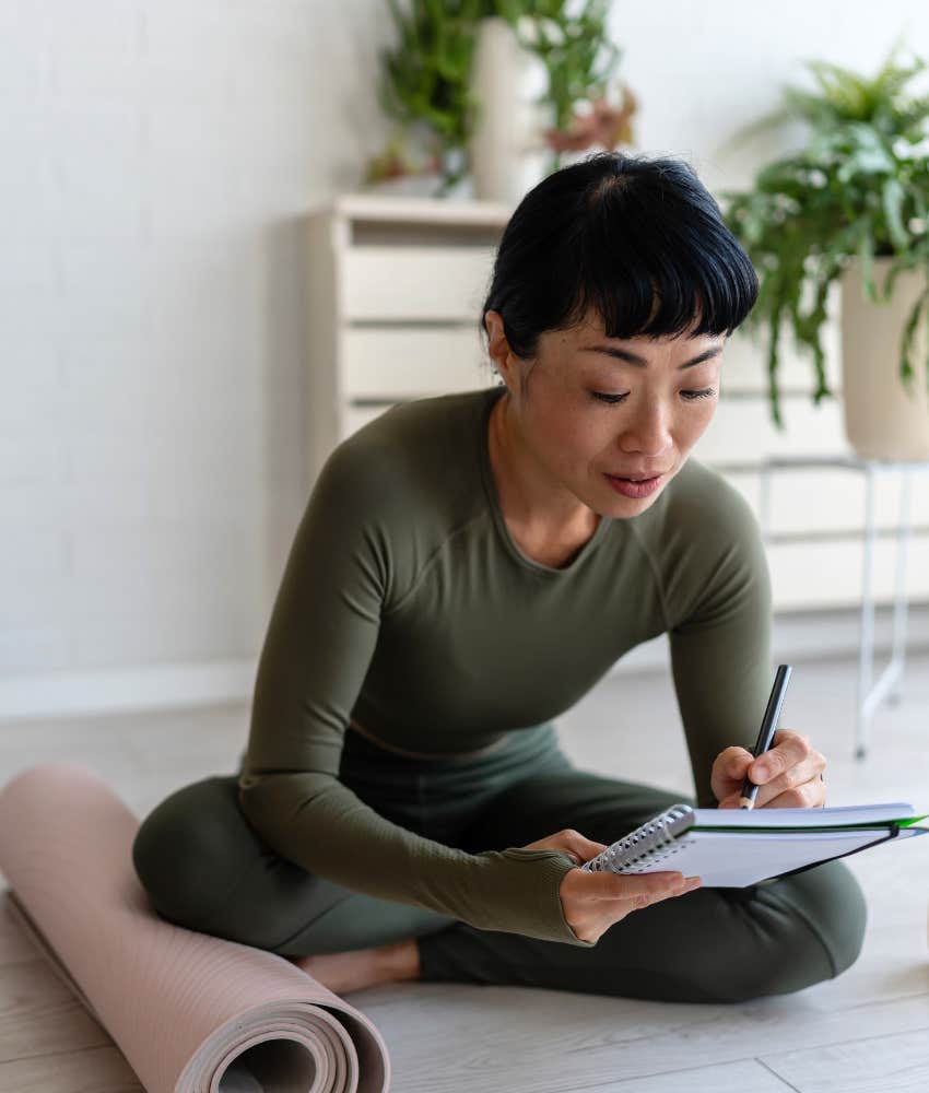 Focused person writes routine plan showing one thing they can control