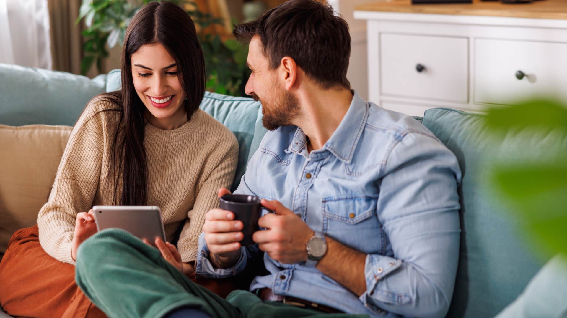 Consistent man smiling with his wife.