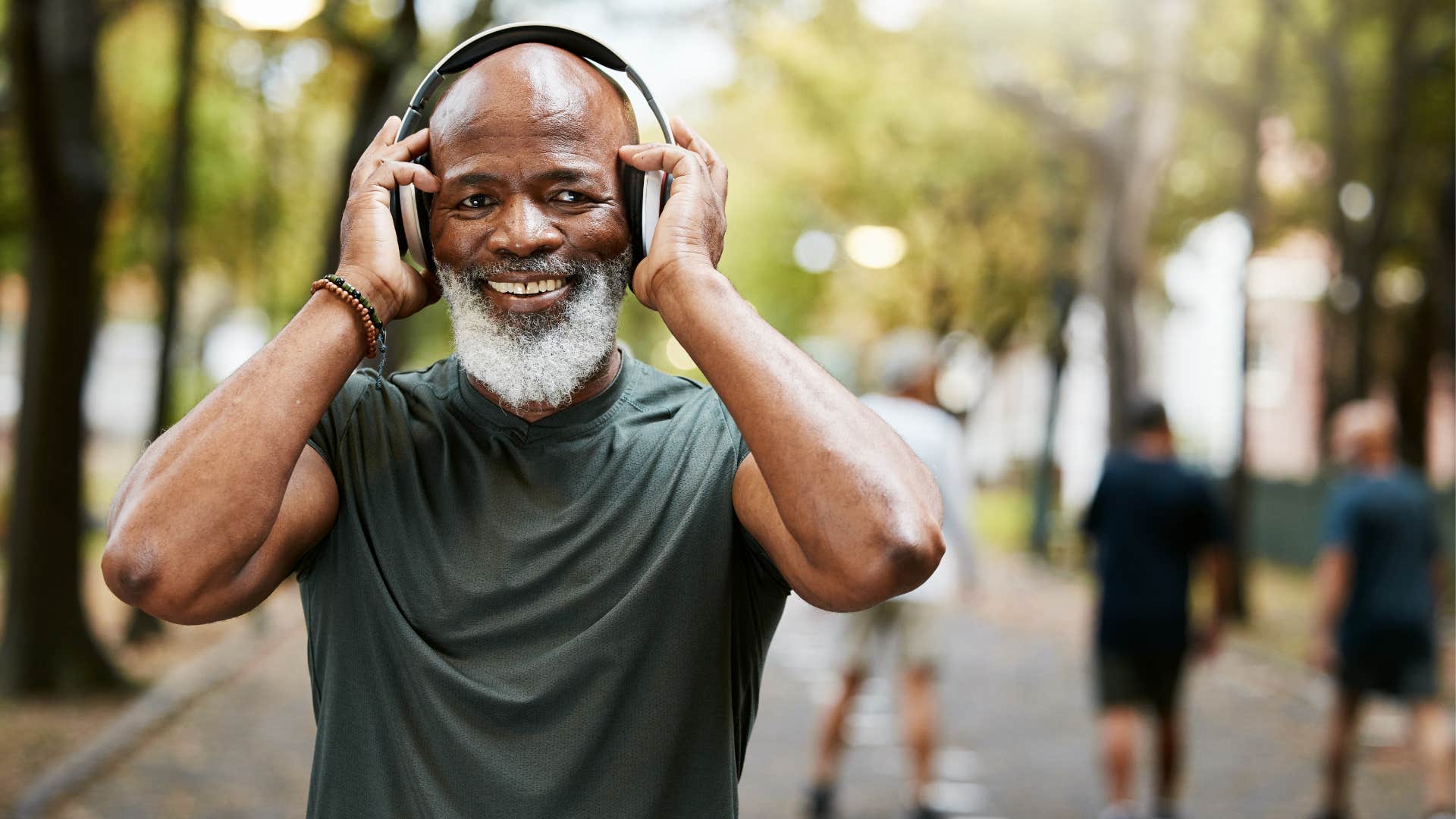 Happy Gen-Xer jogging showing nothing is impossible