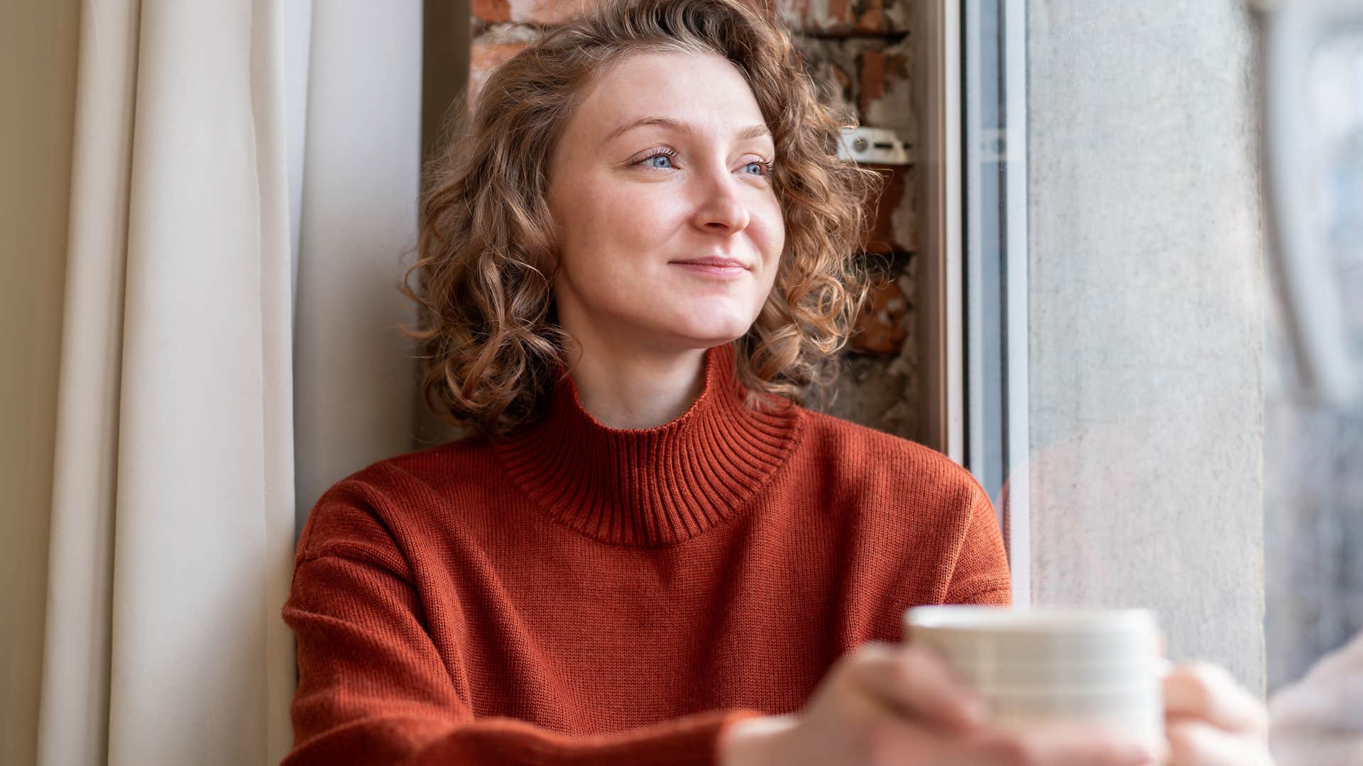 Woman who's comfortable with their own company resting at home.