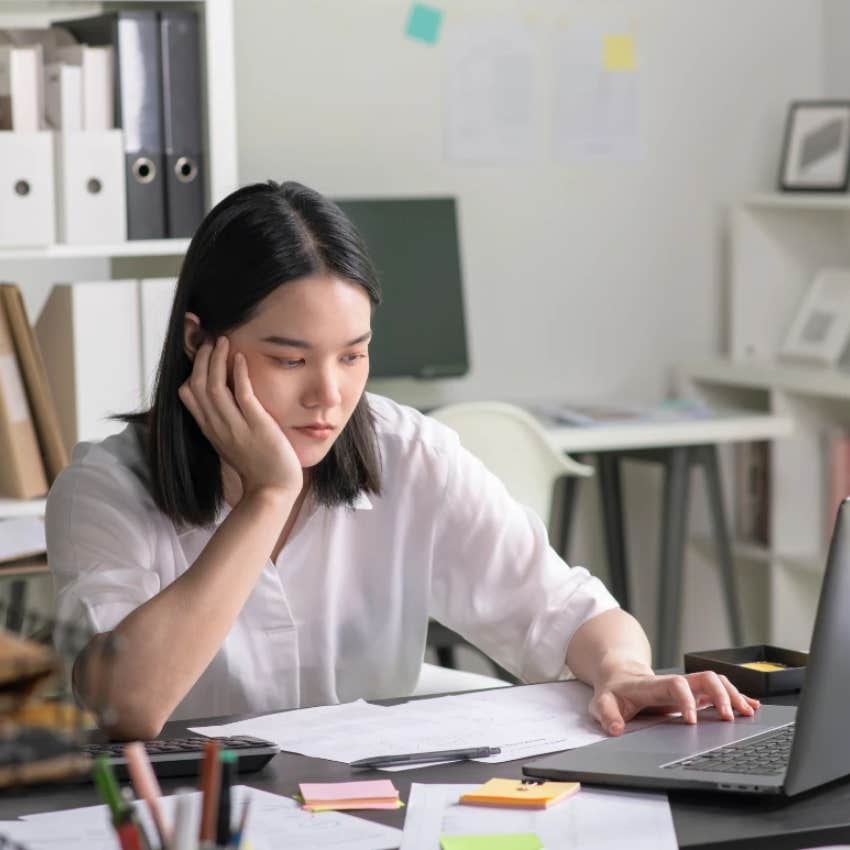 gen z woman ignoring important emails at work