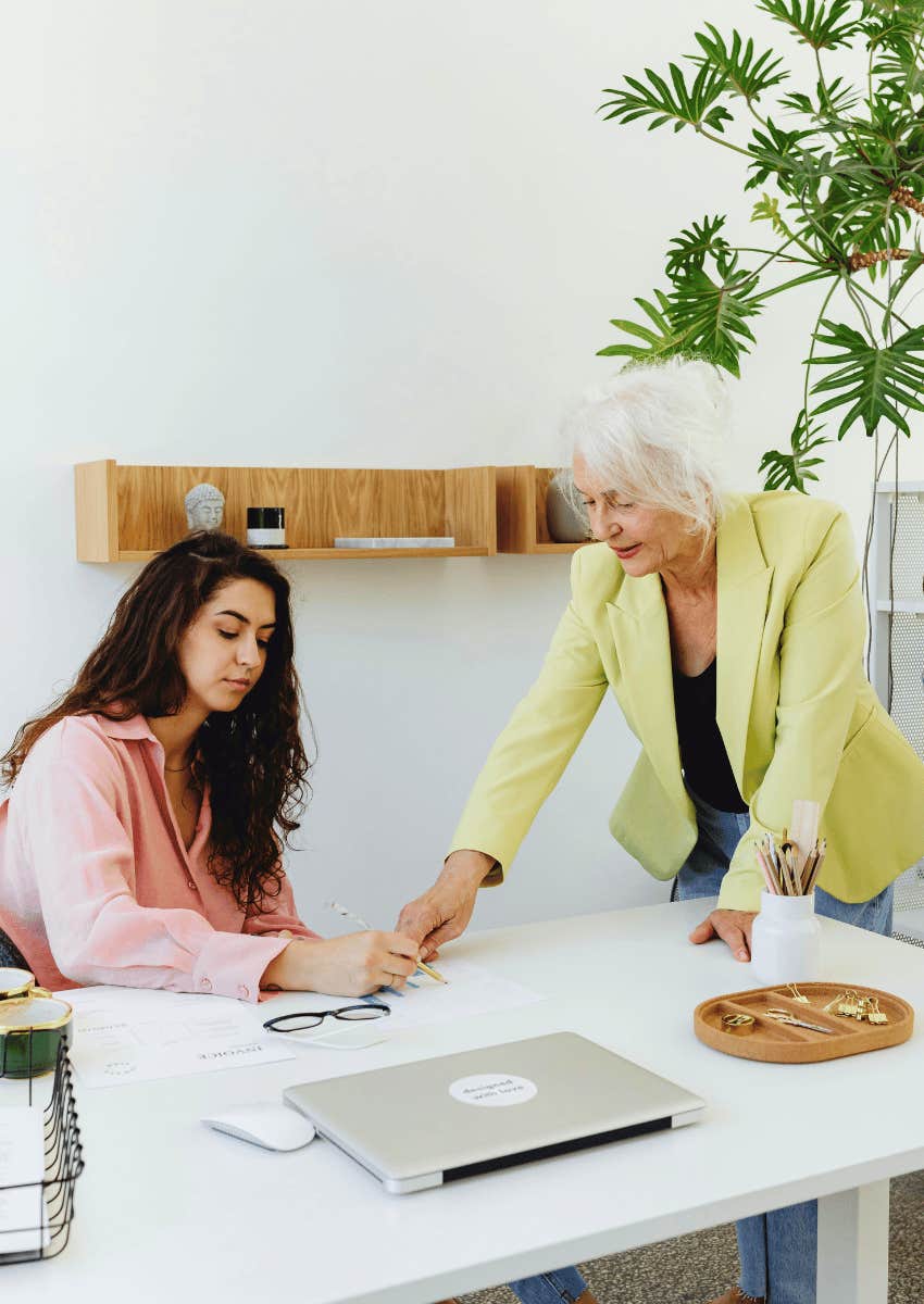 gen-z and older woman working together