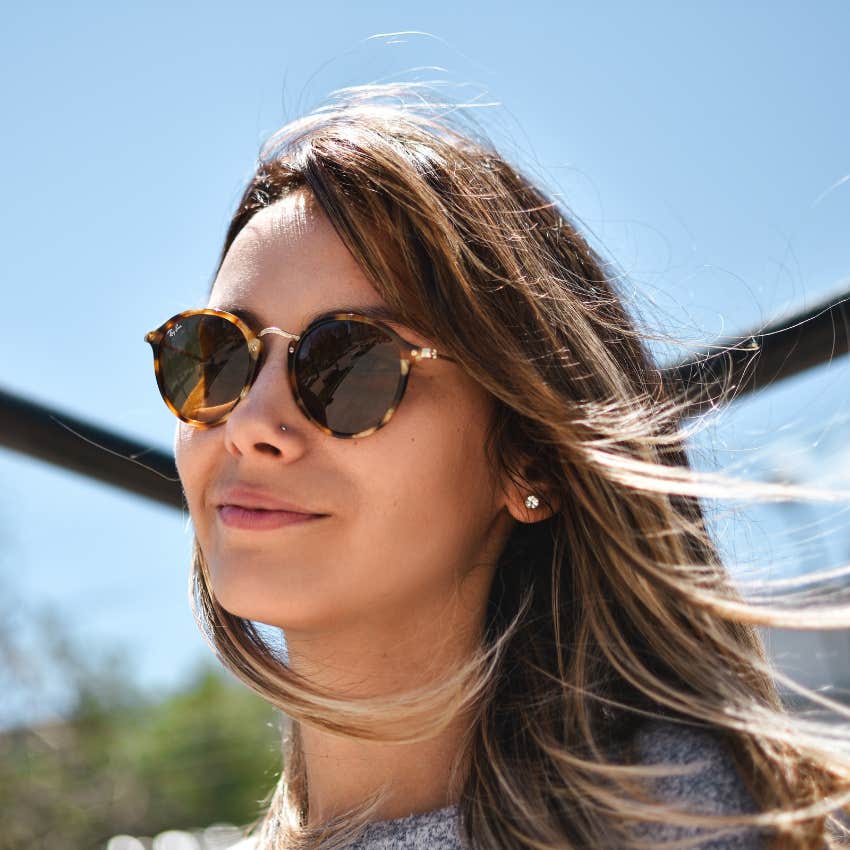 gen z woman happy single choosing a career over relationship