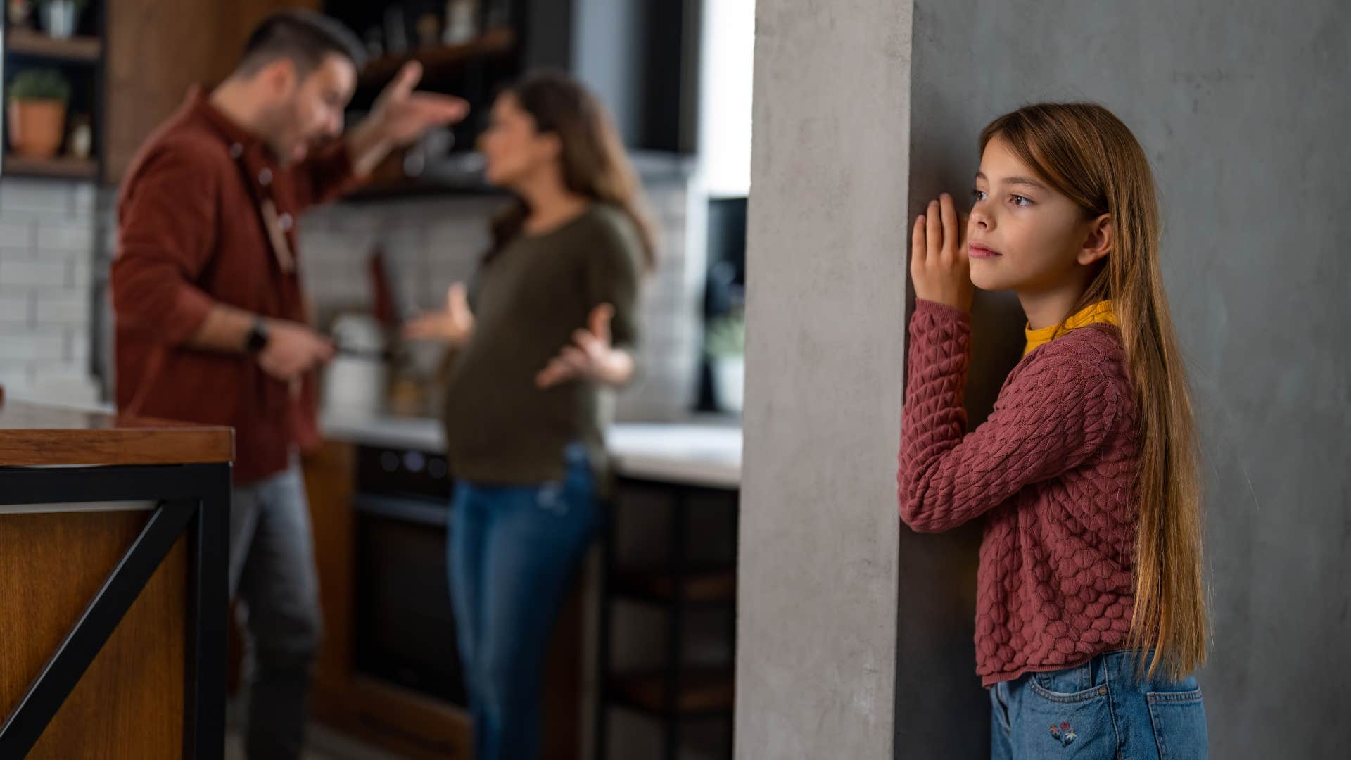 young girl hyper-aware of conflict with her parents in dysfunctional home